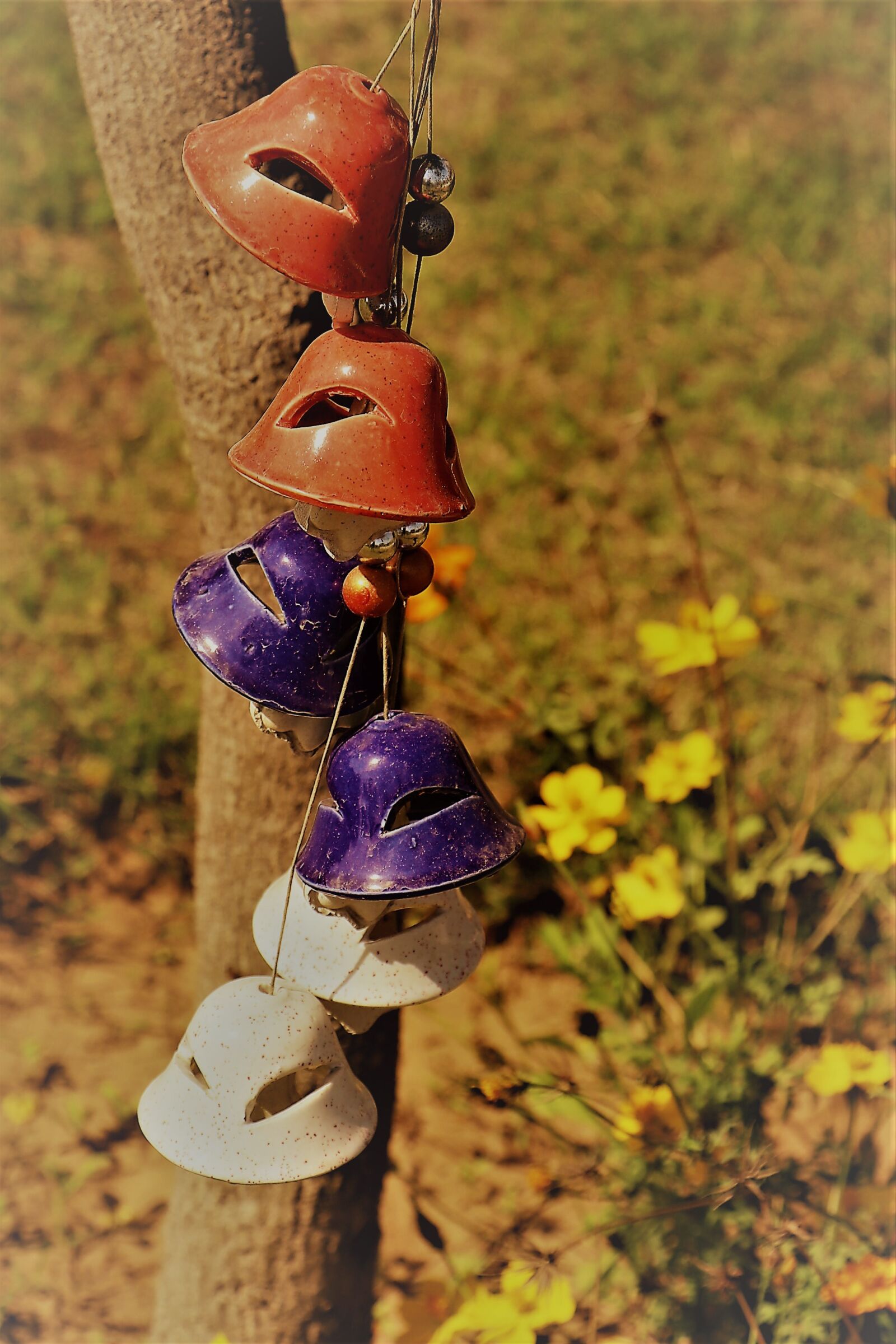 Canon EF-S 18-135mm F3.5-5.6 IS USM sample photo. Bells, tree, colours photography