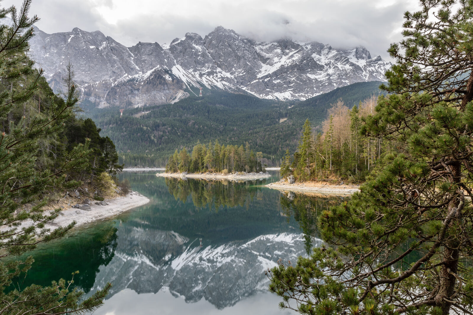 Nikon D610 sample photo. Calm, waters, clouds, conifer photography