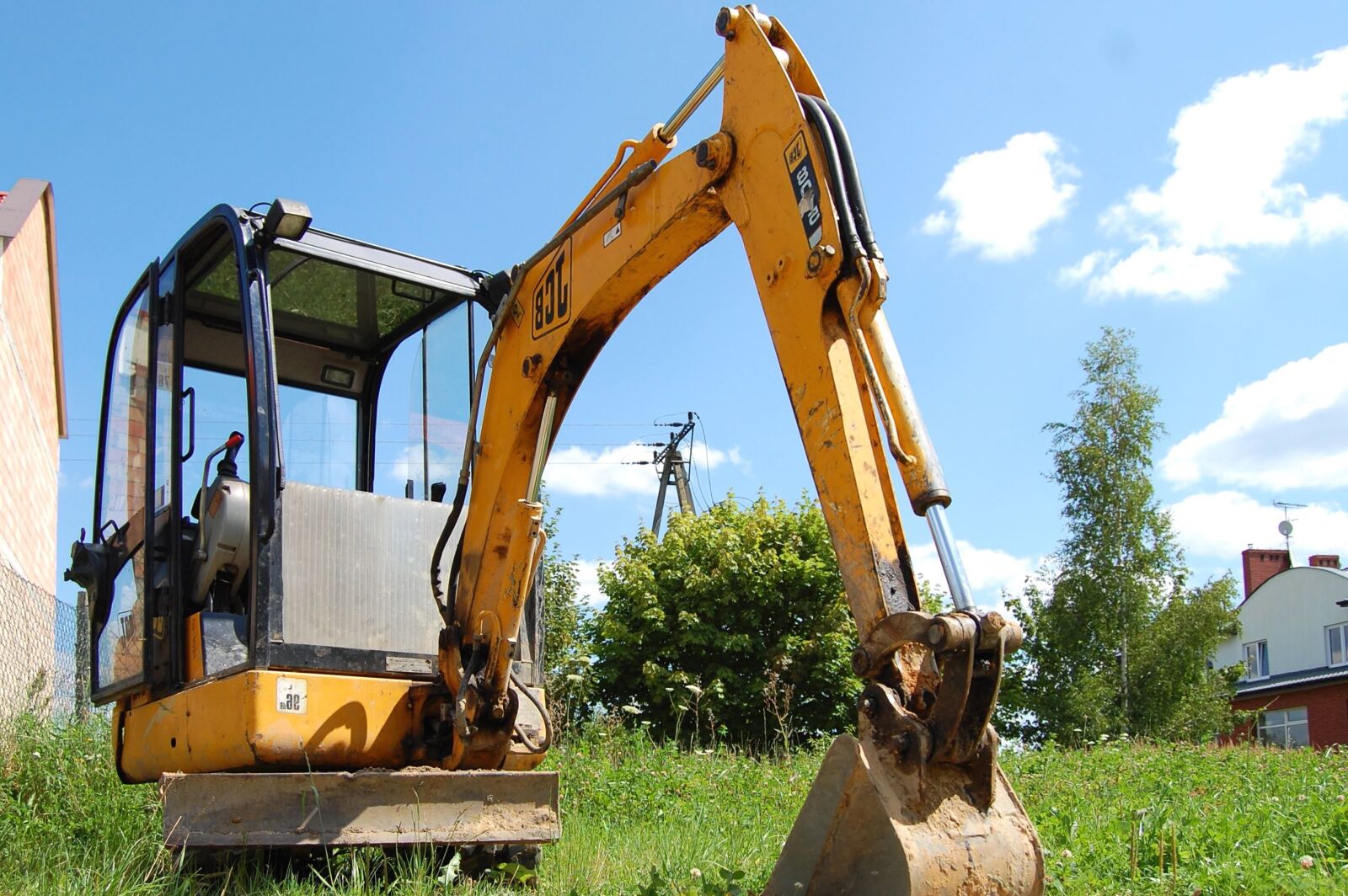 Nikon D40 sample photo. Sky, grass, machine, excavator photography