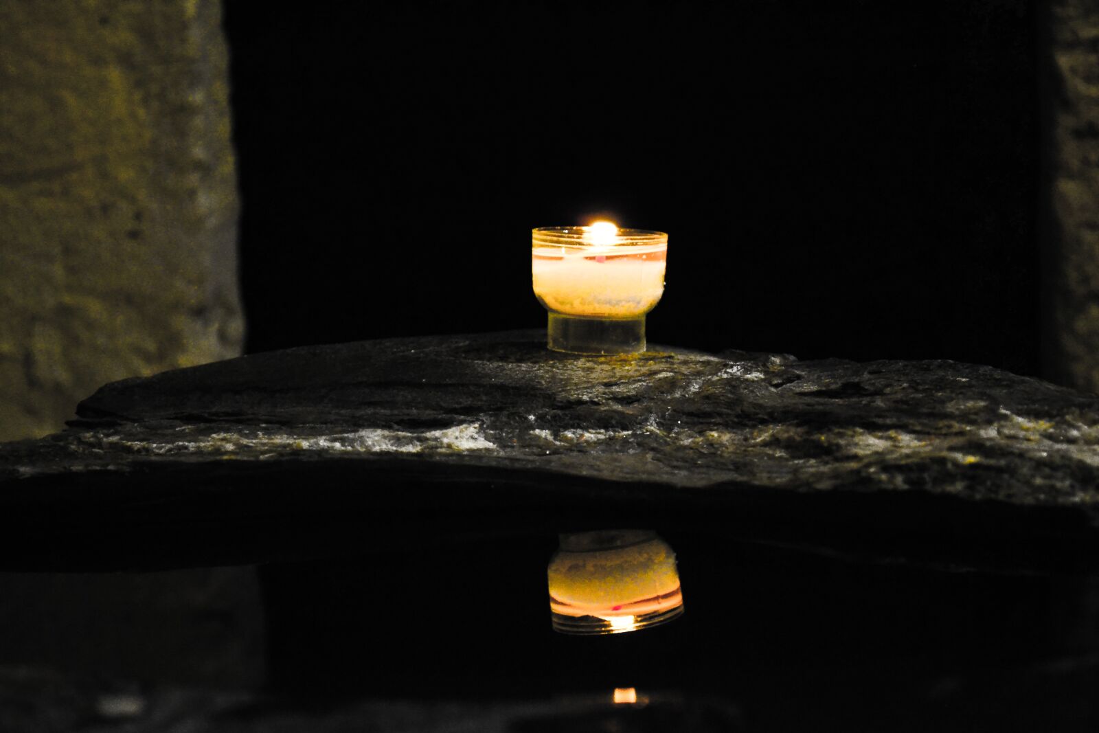 Nikon D3100 sample photo. Candle, water, pierre photography
