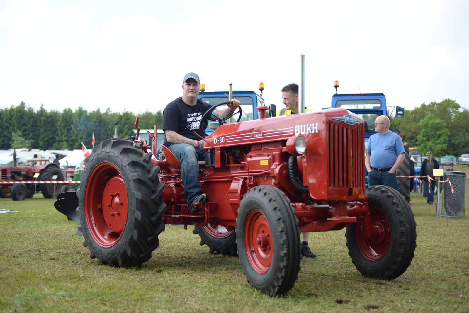 Nikon D600 sample photo. Man on tractor, red photography