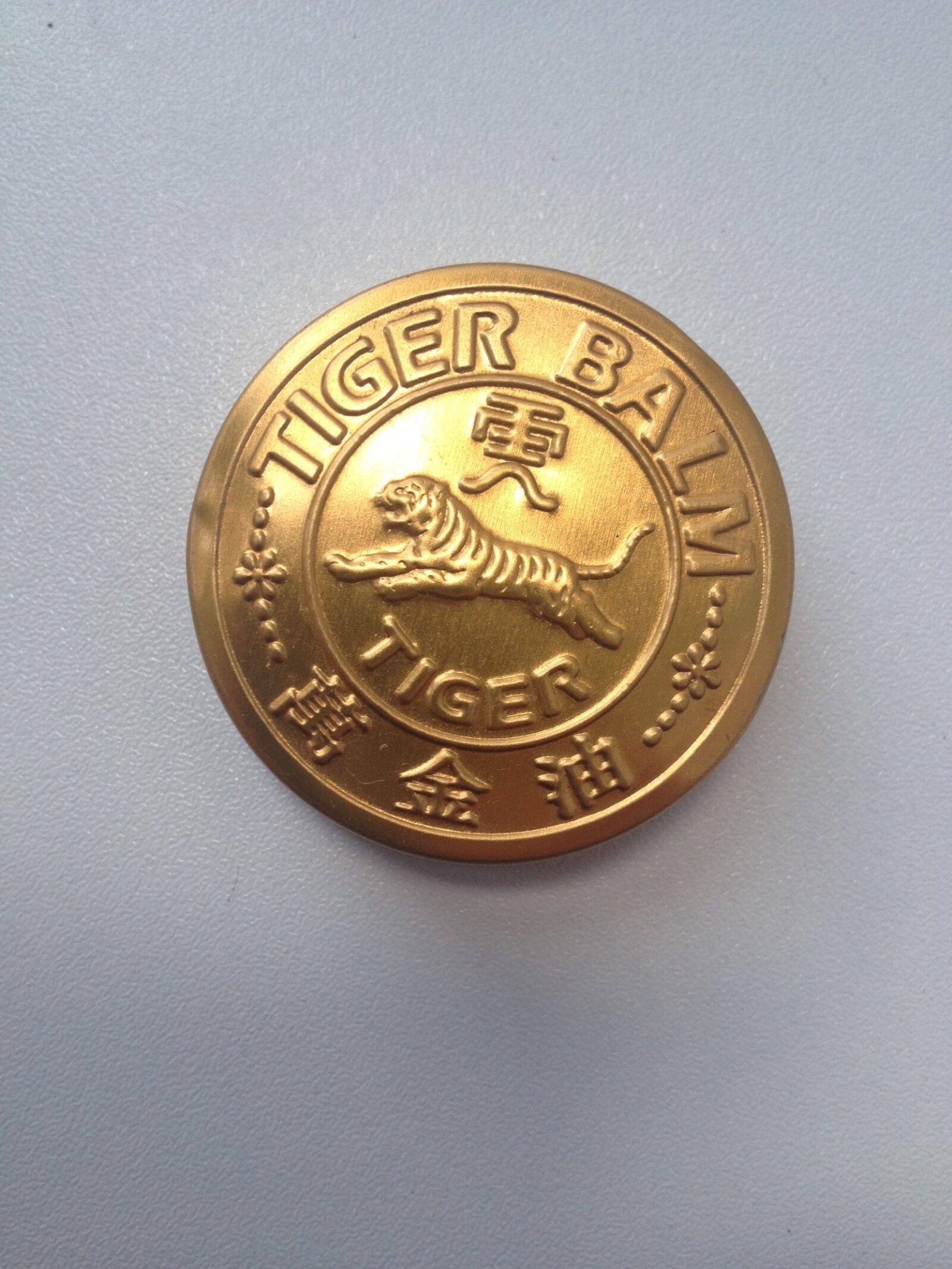iPhone 4S back camera 4.28mm f/2.4 sample photo. Tigerbalm, menthol, nature photography