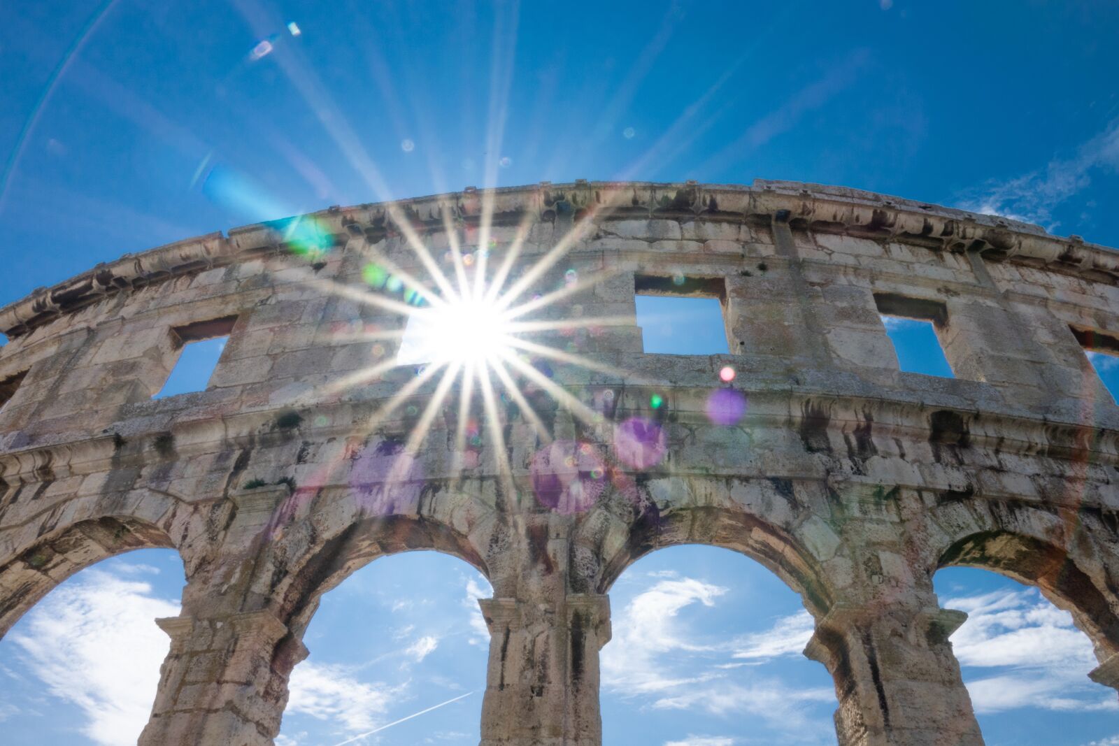 Sony Cyber-shot DSC-RX10 III sample photo. Colosseum, wall, backlighting photography