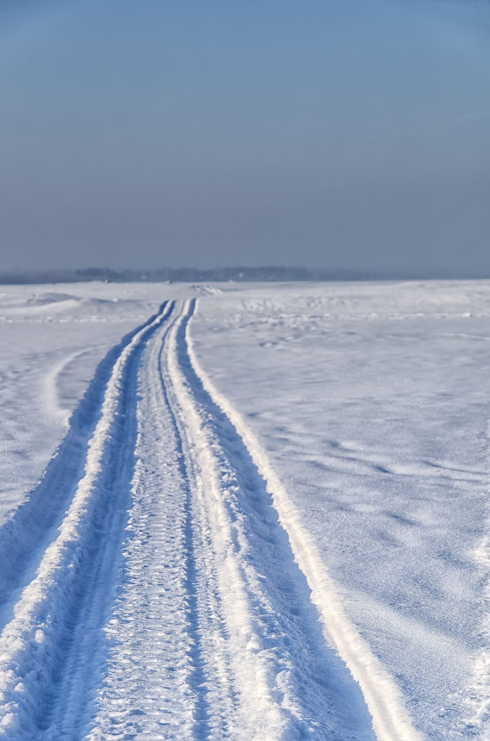 Pentax K-500 sample photo. Snow, road, snowmobile photography