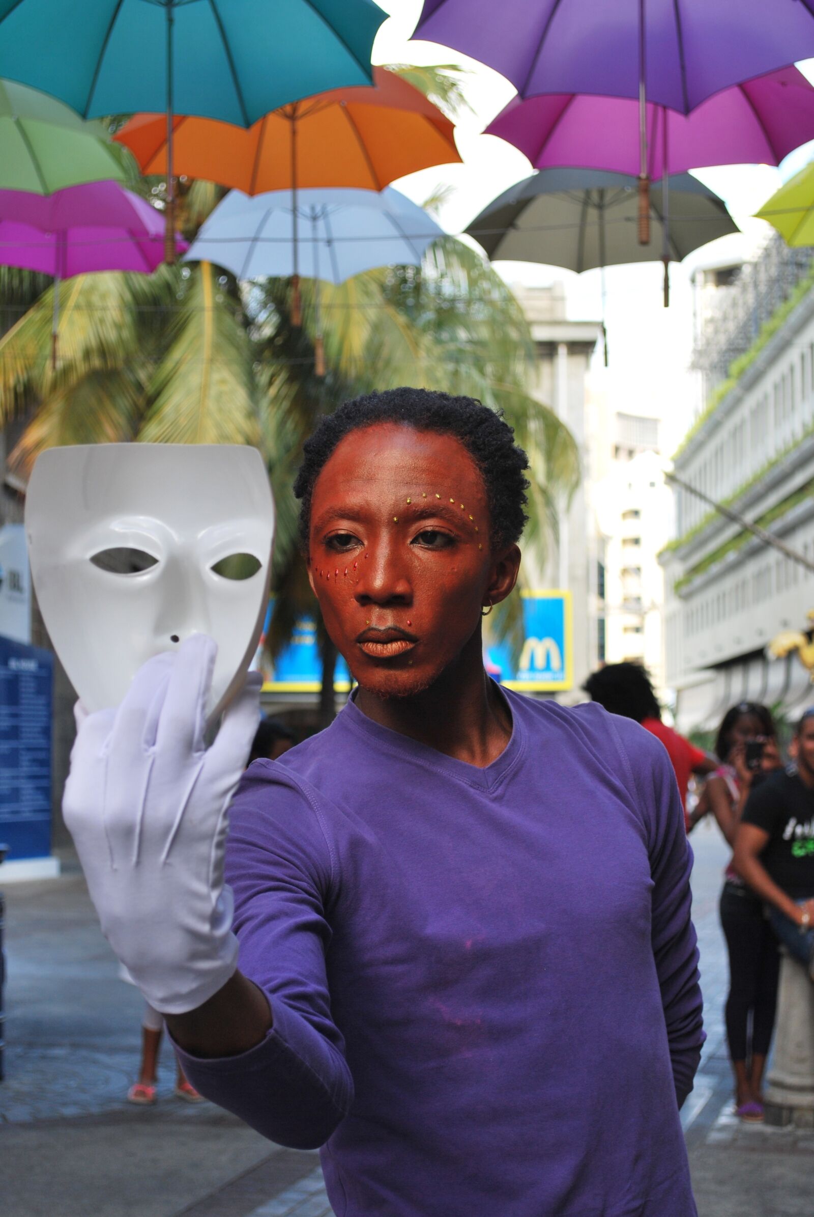 Nikon D60 sample photo. Man, mask, performance photography