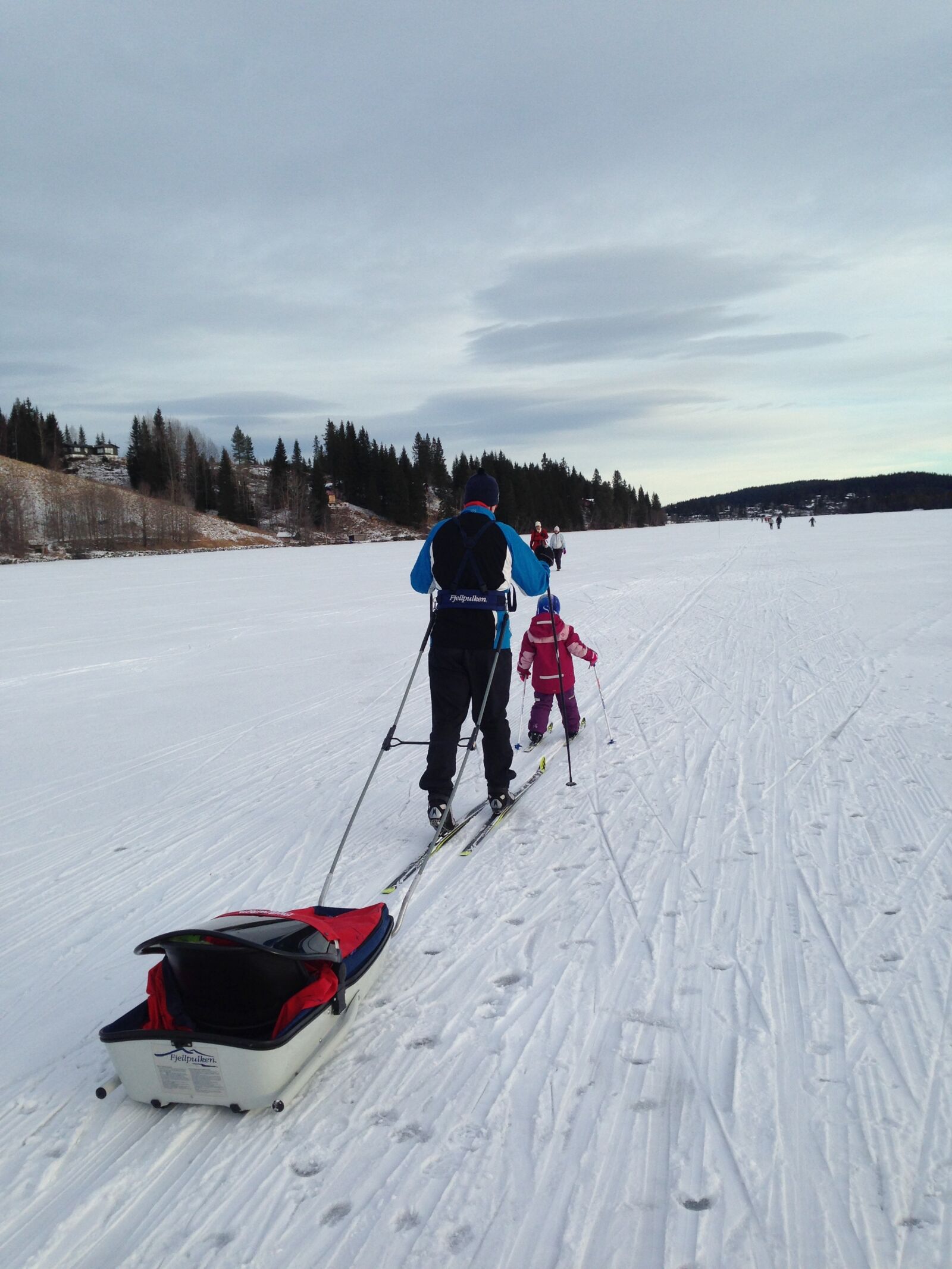 iPhone 5 back camera 4.12mm f/2.4 sample photo. Ski, lake, pulk photography
