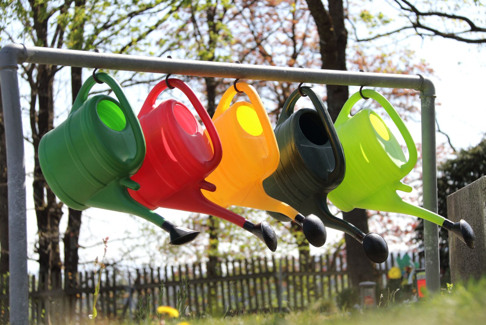 Canon EOS 80D + Canon EF-S 18-200mm F3.5-5.6 IS sample photo. Watering cans, pour in photography