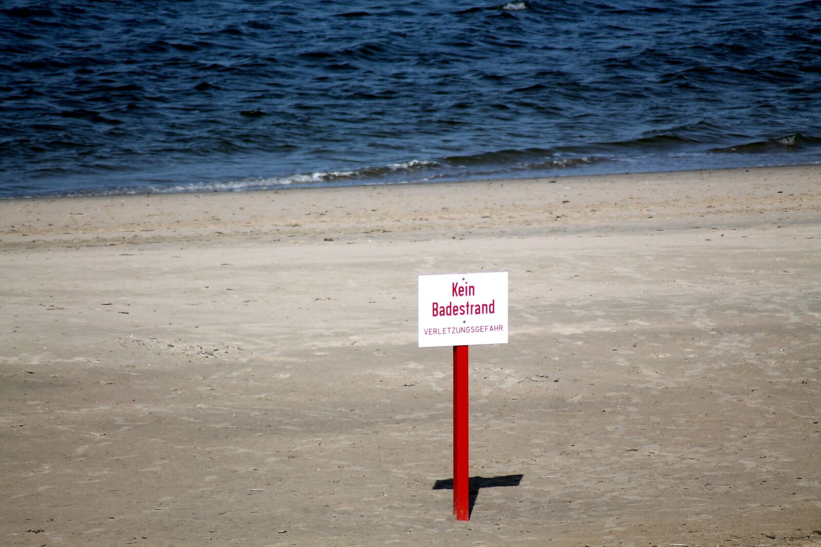 Canon EOS 1100D (EOS Rebel T3 / EOS Kiss X50) sample photo. Shield, note, beach photography