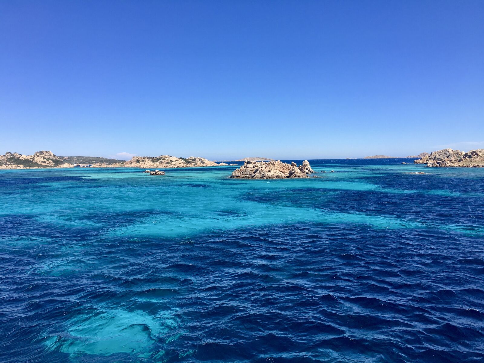 Apple iPhone 6s sample photo. Sardinia, la madelenna, blue photography
