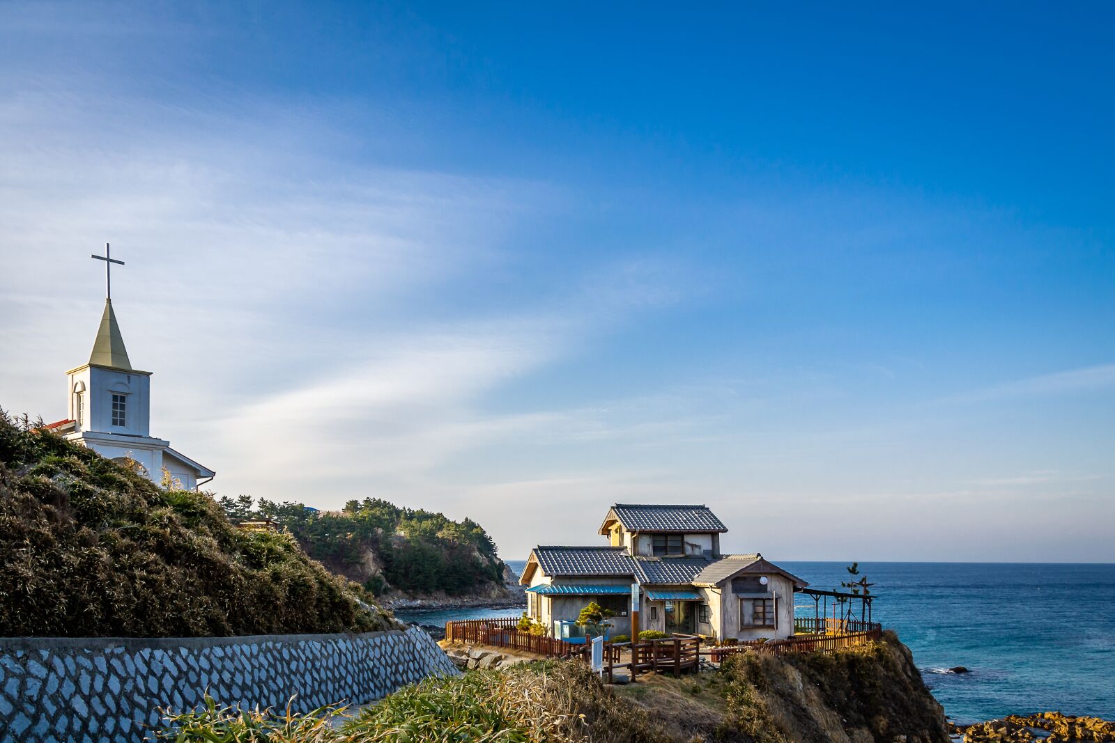 Nikon D3100 sample photo. Sea, hill, house photography