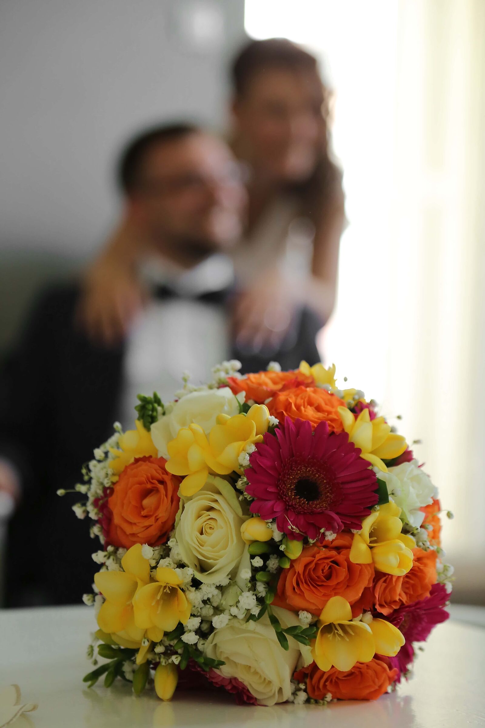 Canon EF 24-105mm F4L IS USM sample photo. Wedding bouquet, blurry, bride photography