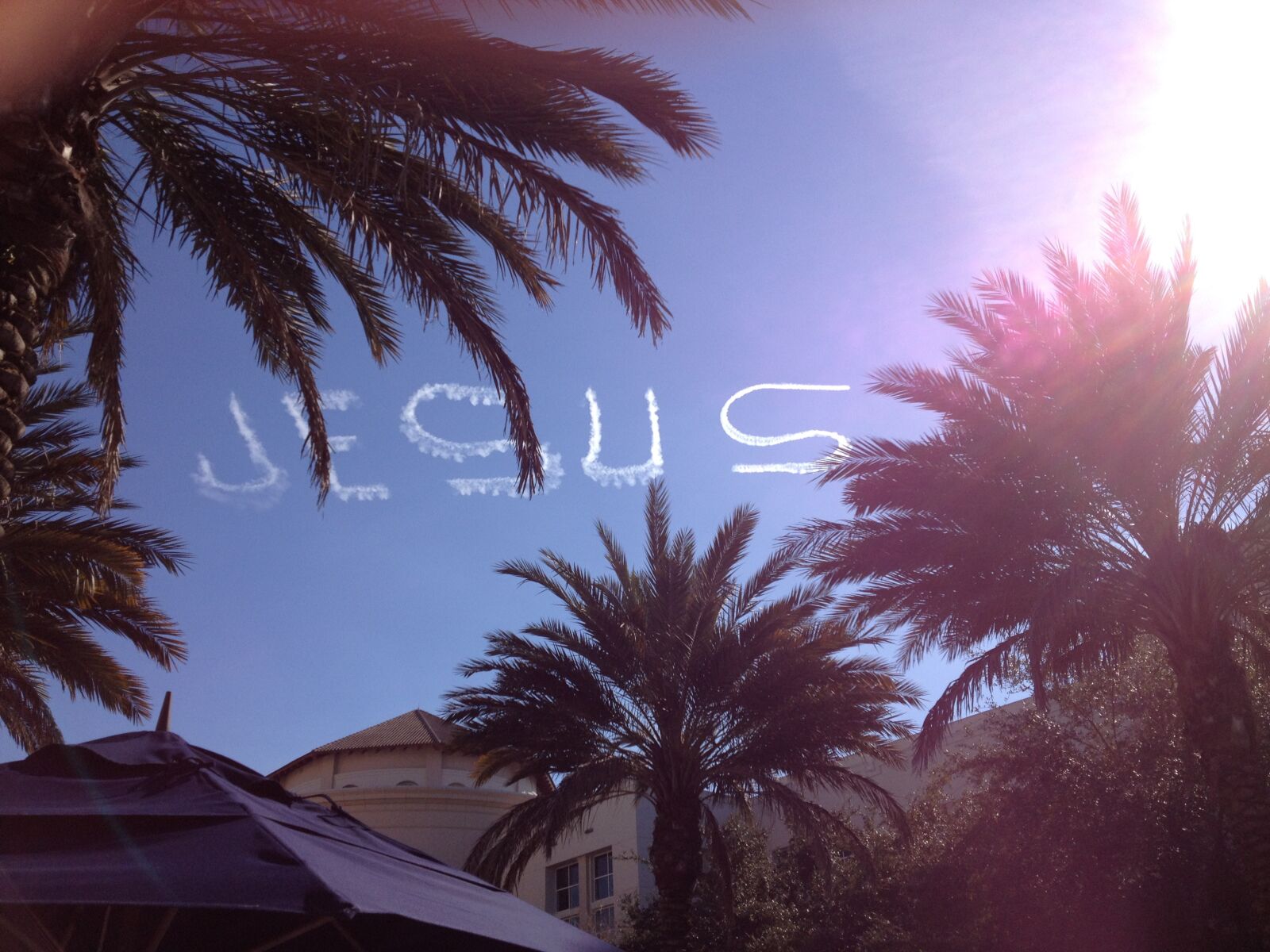 iPhone 4S back camera 4.28mm f/2.4 sample photo. Jesus skywriter, skywriting, jesus photography