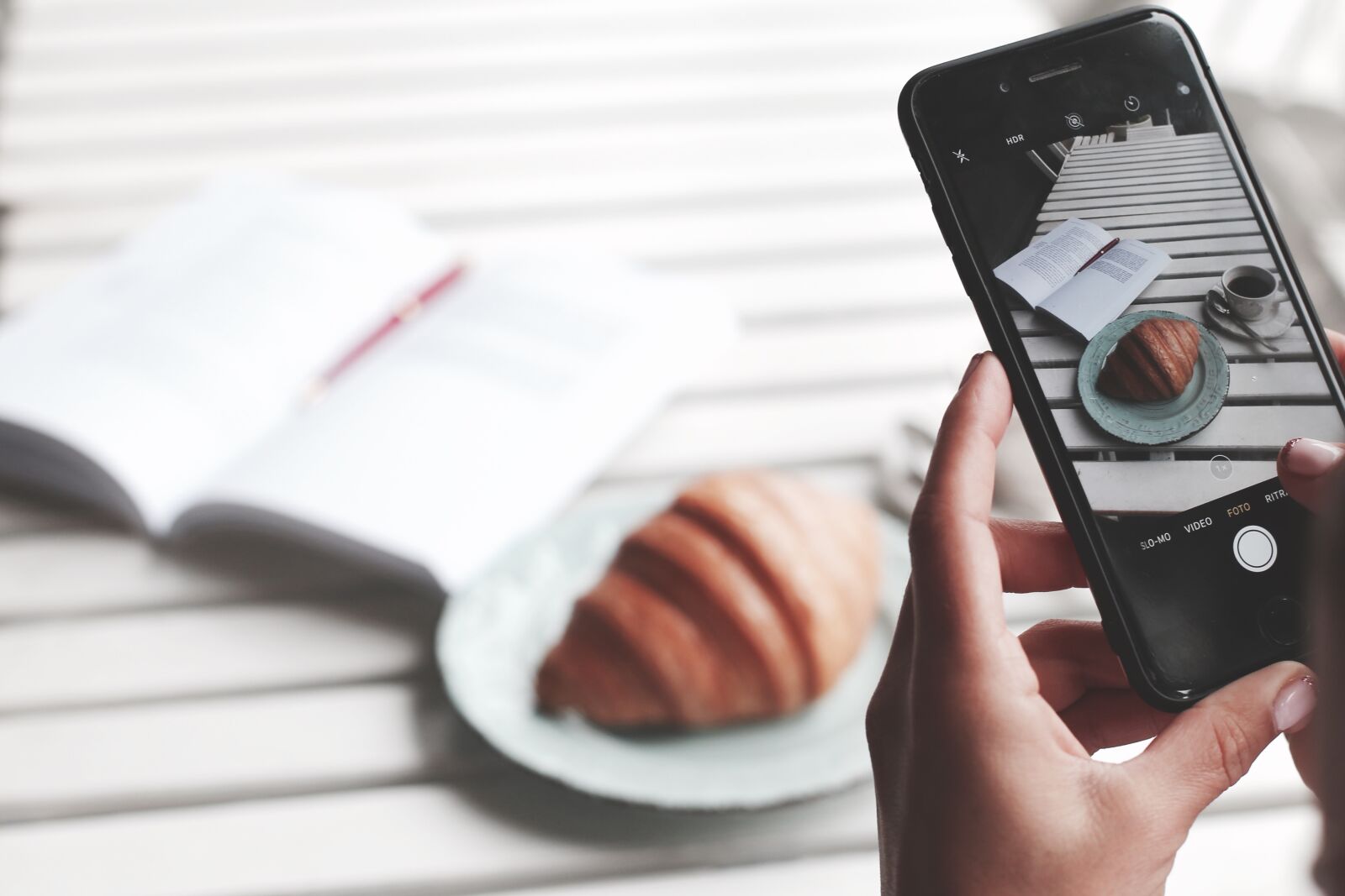 Canon EOS 6D + Canon EF 50mm F1.4 USM sample photo. Breakfast, smartphone, a croissant photography