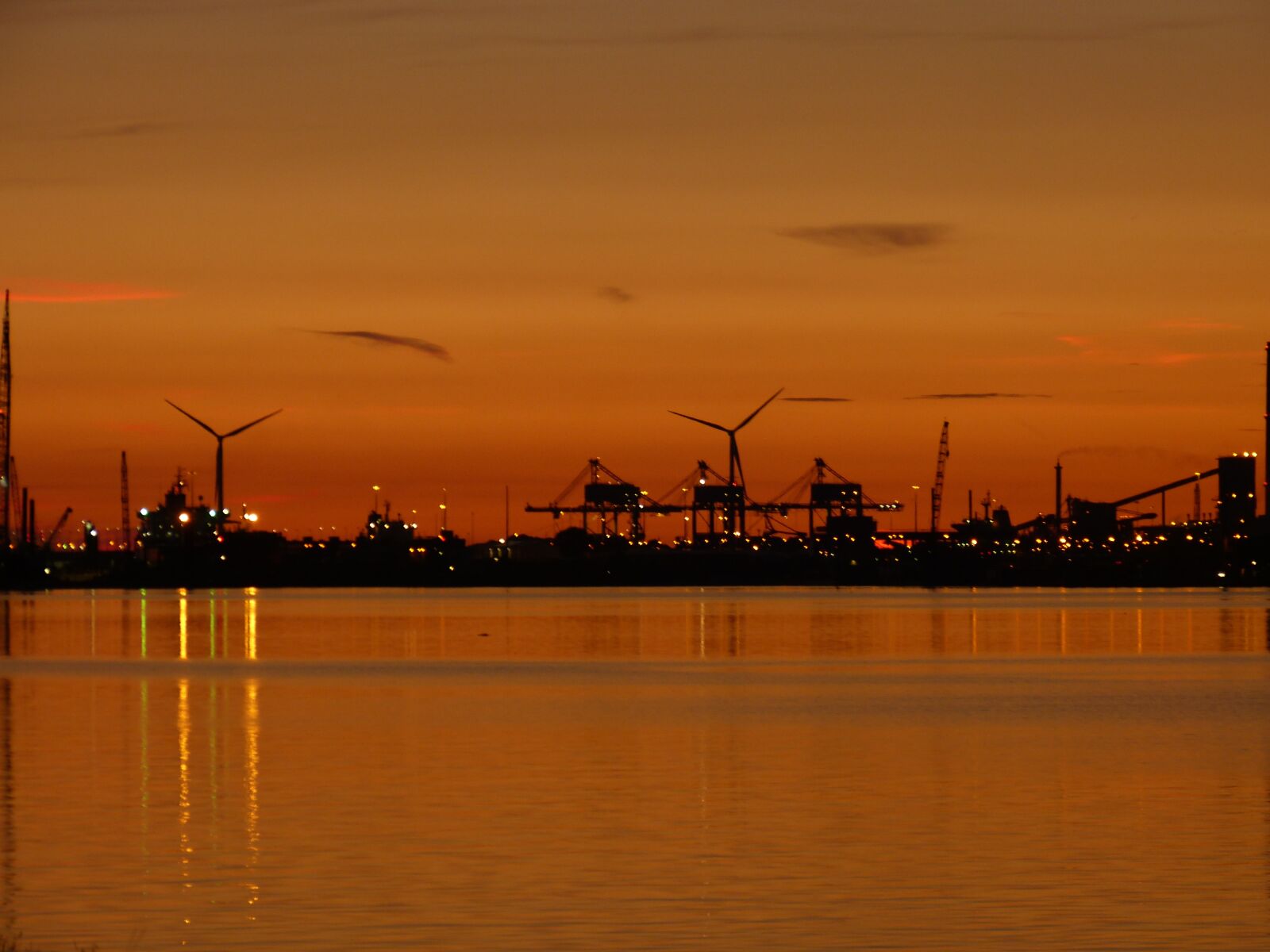 Panasonic Lumix DMC-FZ150 sample photo. Sunset, waters, industry photography