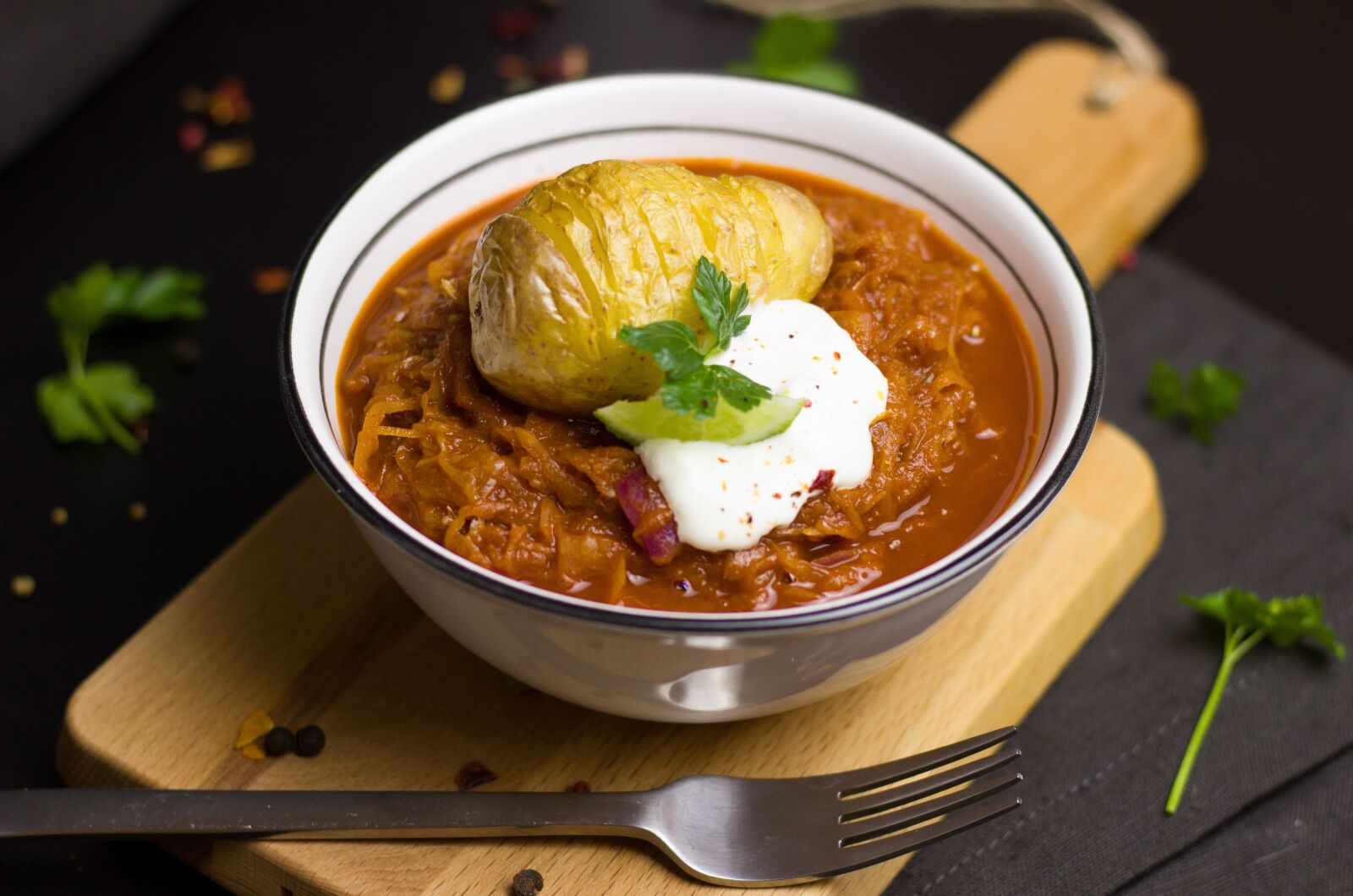 Canon EOS 600D (Rebel EOS T3i / EOS Kiss X5) + Canon EF 50mm F1.8 STM sample photo. Stew, herb, sauerkraut photography