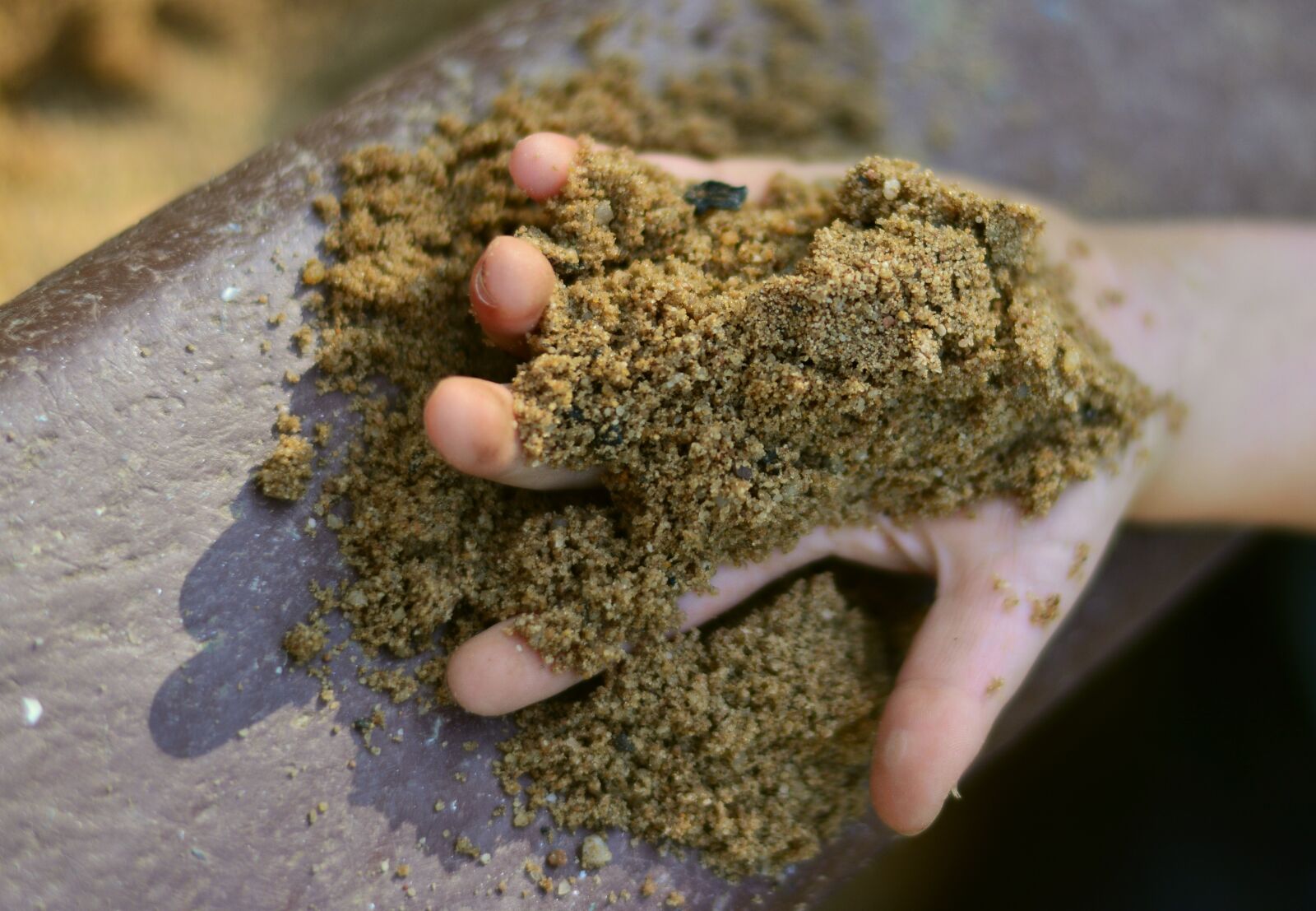 Nikon D5200 sample photo. Sand, child's hand, playground photography