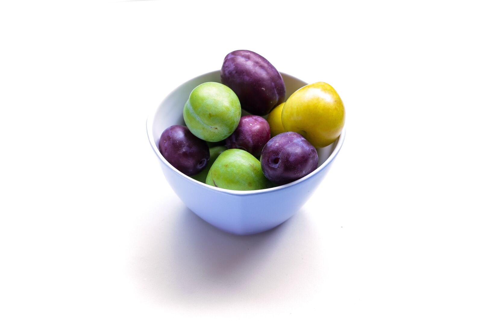 Canon EOS 70D + Canon EF 50mm F1.8 II sample photo. Plum, eating, healthy food photography