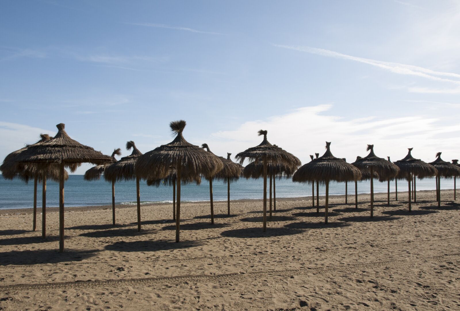 Olympus E-510 (EVOLT E-510) sample photo. Beach, umbrellas, shadow photography