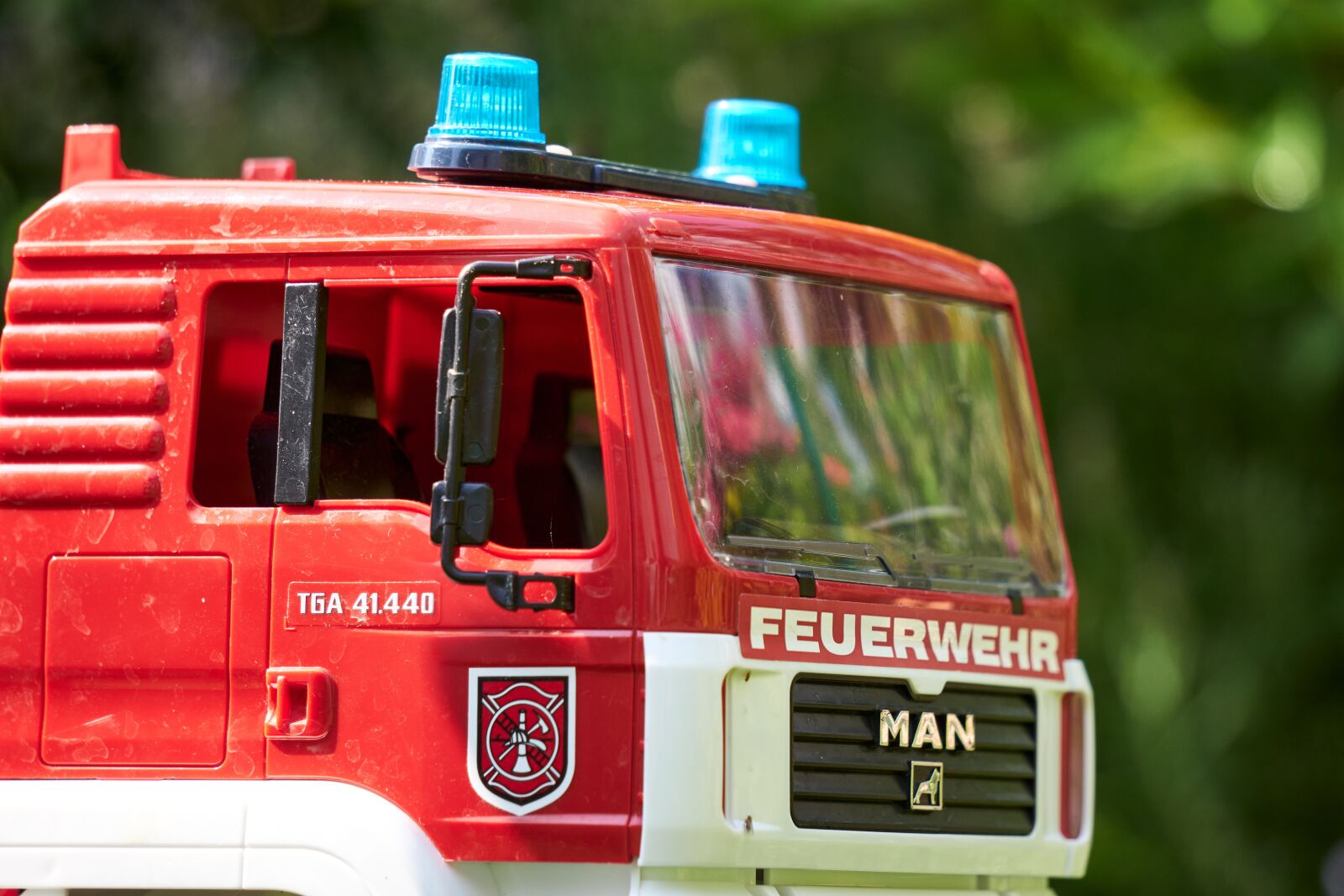Sony E 55-210mm F4.5-6.3 OSS sample photo. Fire, toys, blue light photography