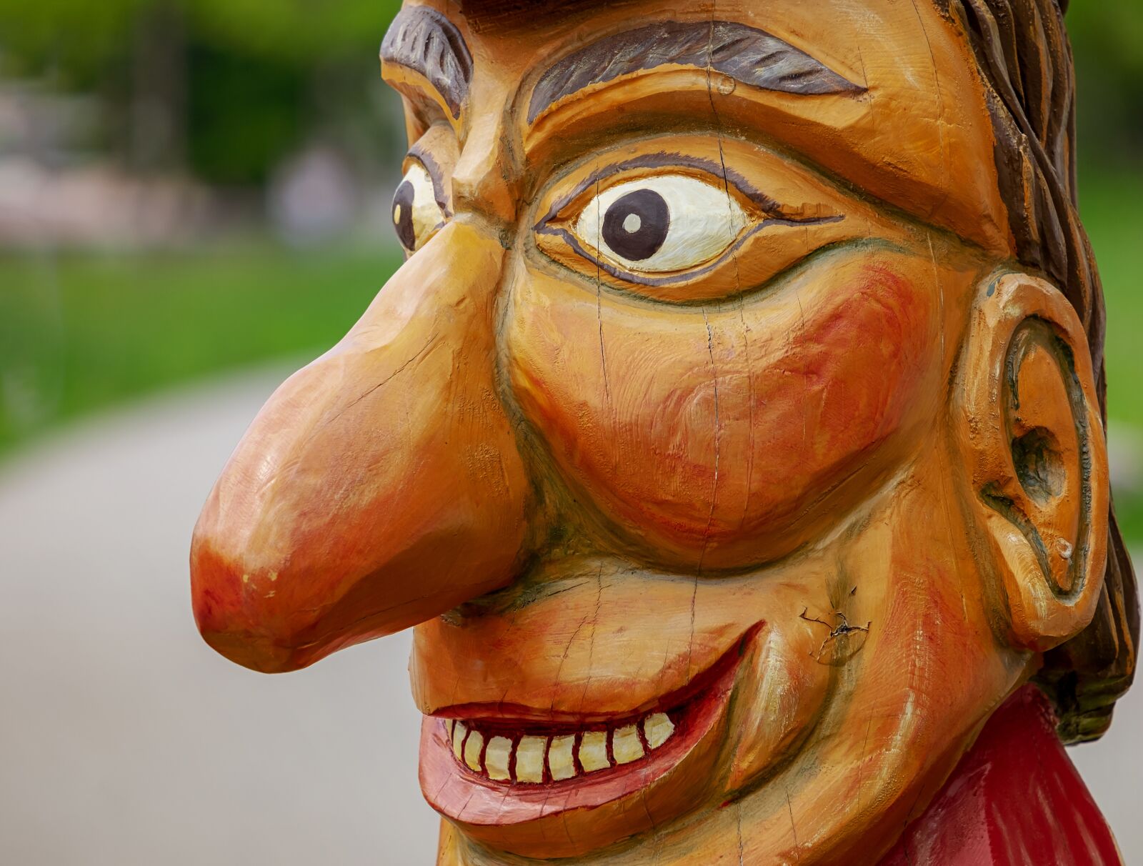 Fujifilm XF 55-200mm F3.5-4.8 R LM OIS sample photo. Sculpture, wood, face photography