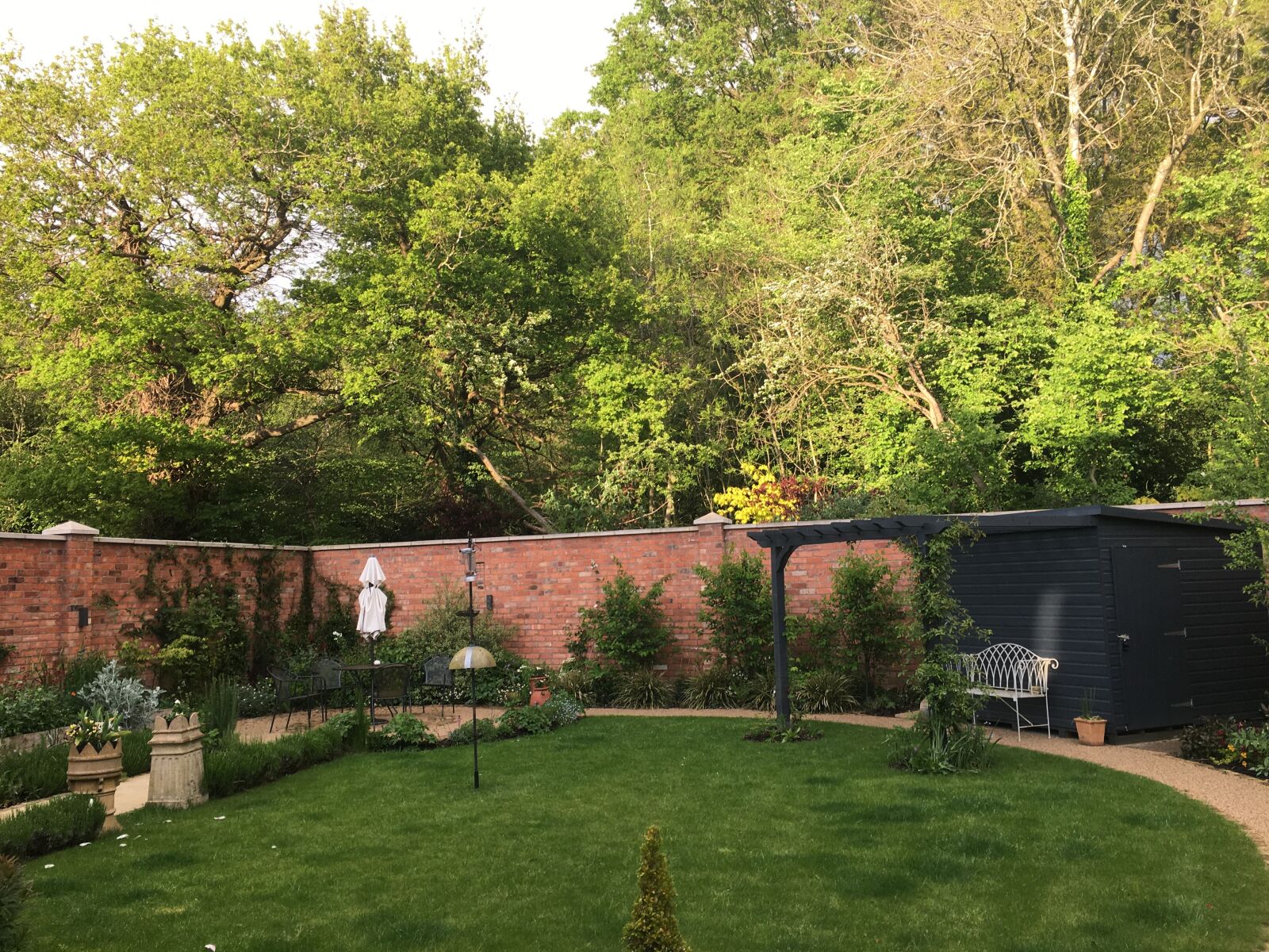 Apple iPhone 6s sample photo. Garden, circular path, pergola photography