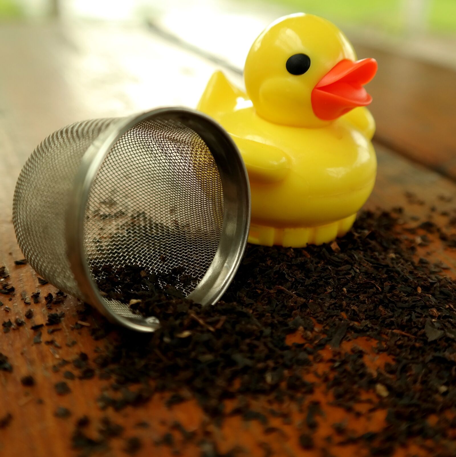 Samsung NX300M sample photo. Duck, tea infuser, tee photography