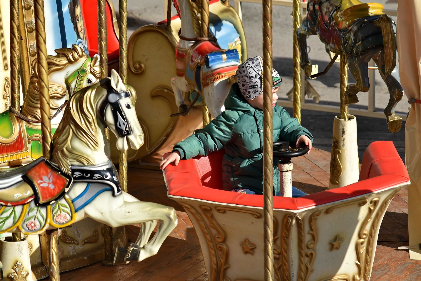 Nikon D5500 sample photo. Amusement, carousel, kid, mechanism photography