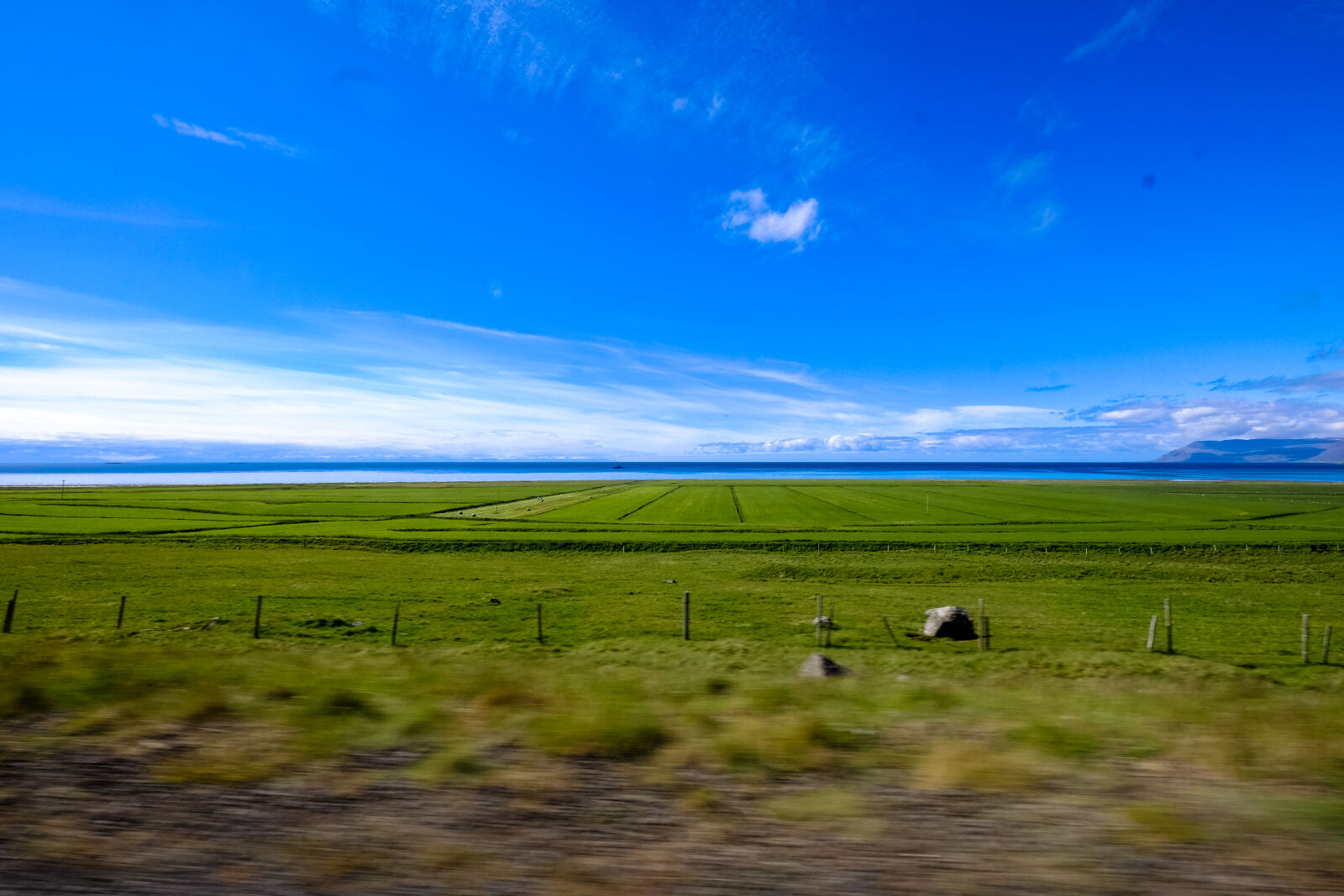 Fujifilm XF 10-24mm F4 R OIS sample photo. Blur, clouds, countryside, cropland photography