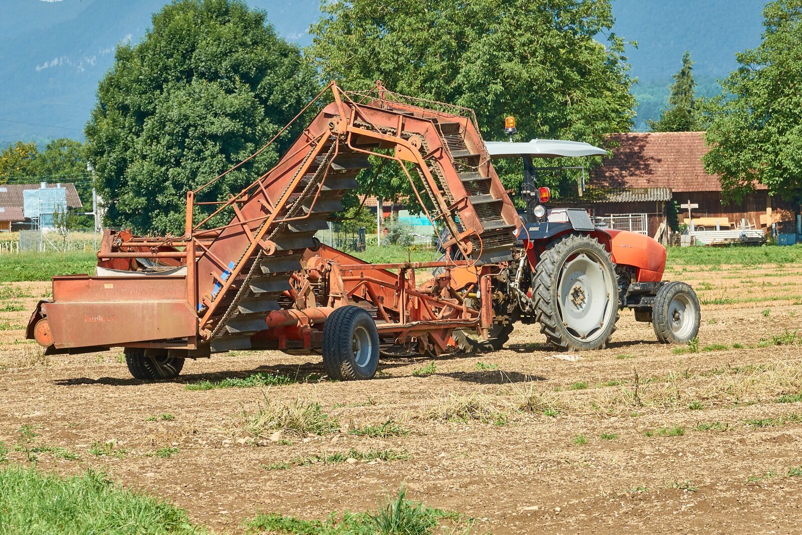 Sony Cyber-shot DSC-RX10 III sample photo. Agriculture, tractor, vehicle photography
