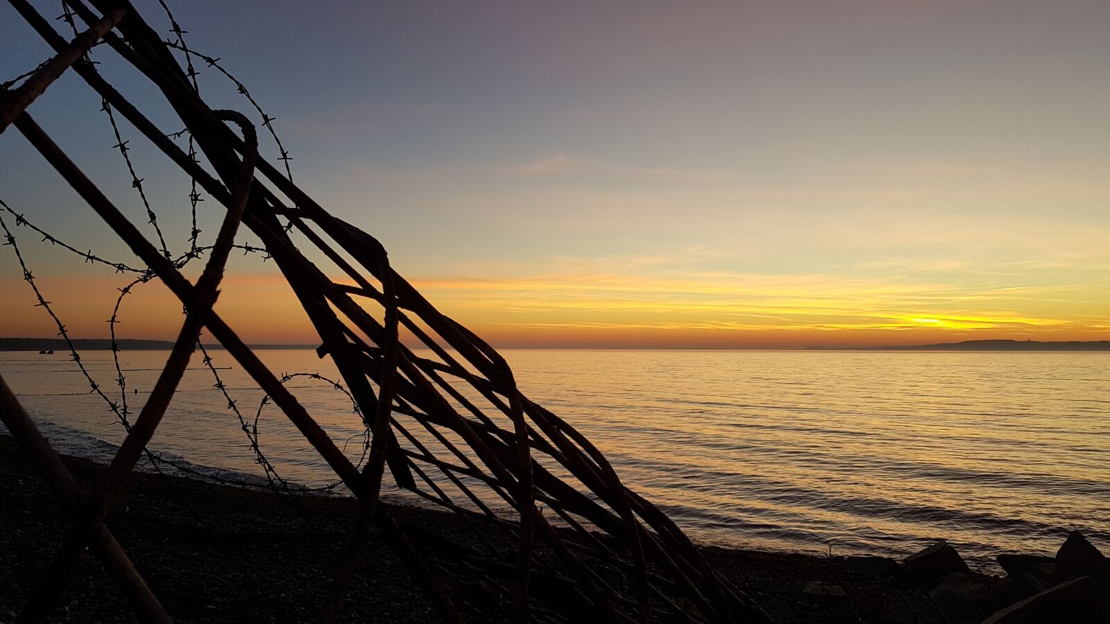 Samsung Galaxy S7 sample photo. Sunset, beach, wire photography