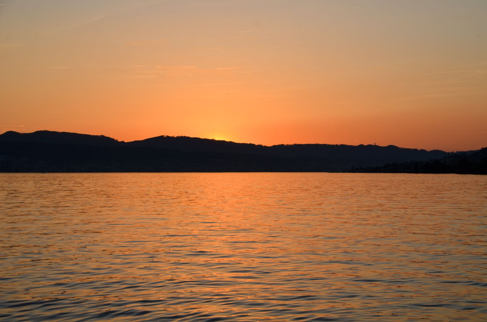 Nikon D7000 sample photo. Sunset, waters, lake zurich photography