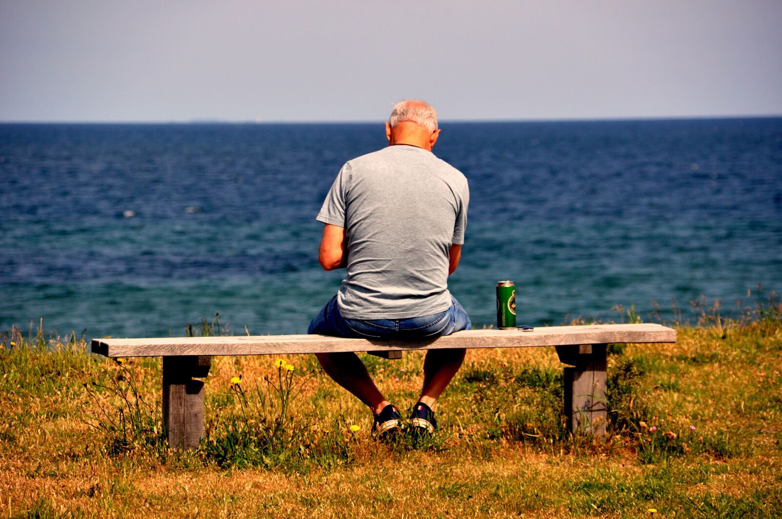 Nikon D90 sample photo. Pause, ocean, bench photography