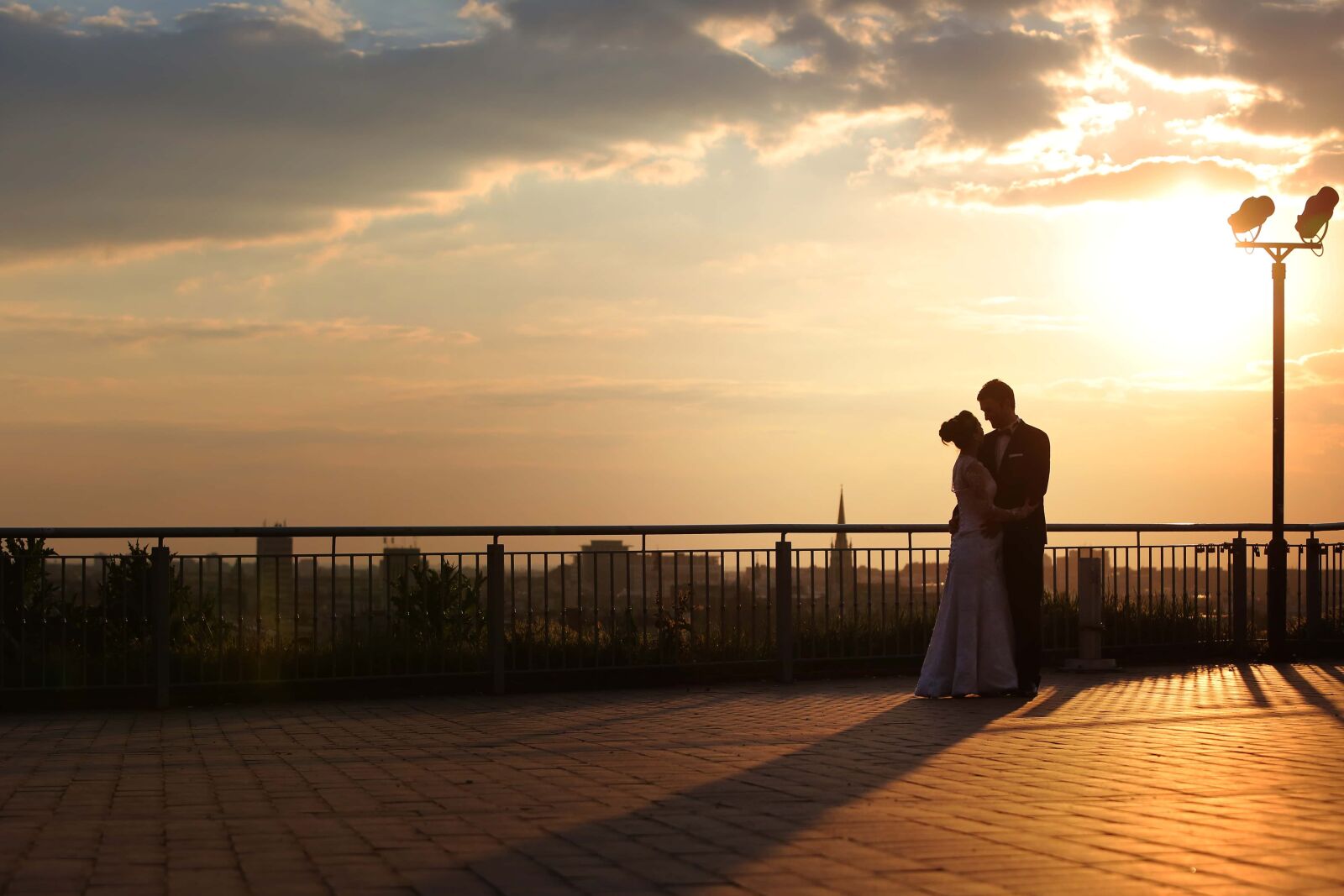 Canon EF 70-200mm F2.8L IS USM sample photo. Bride, fence, groom, love photography