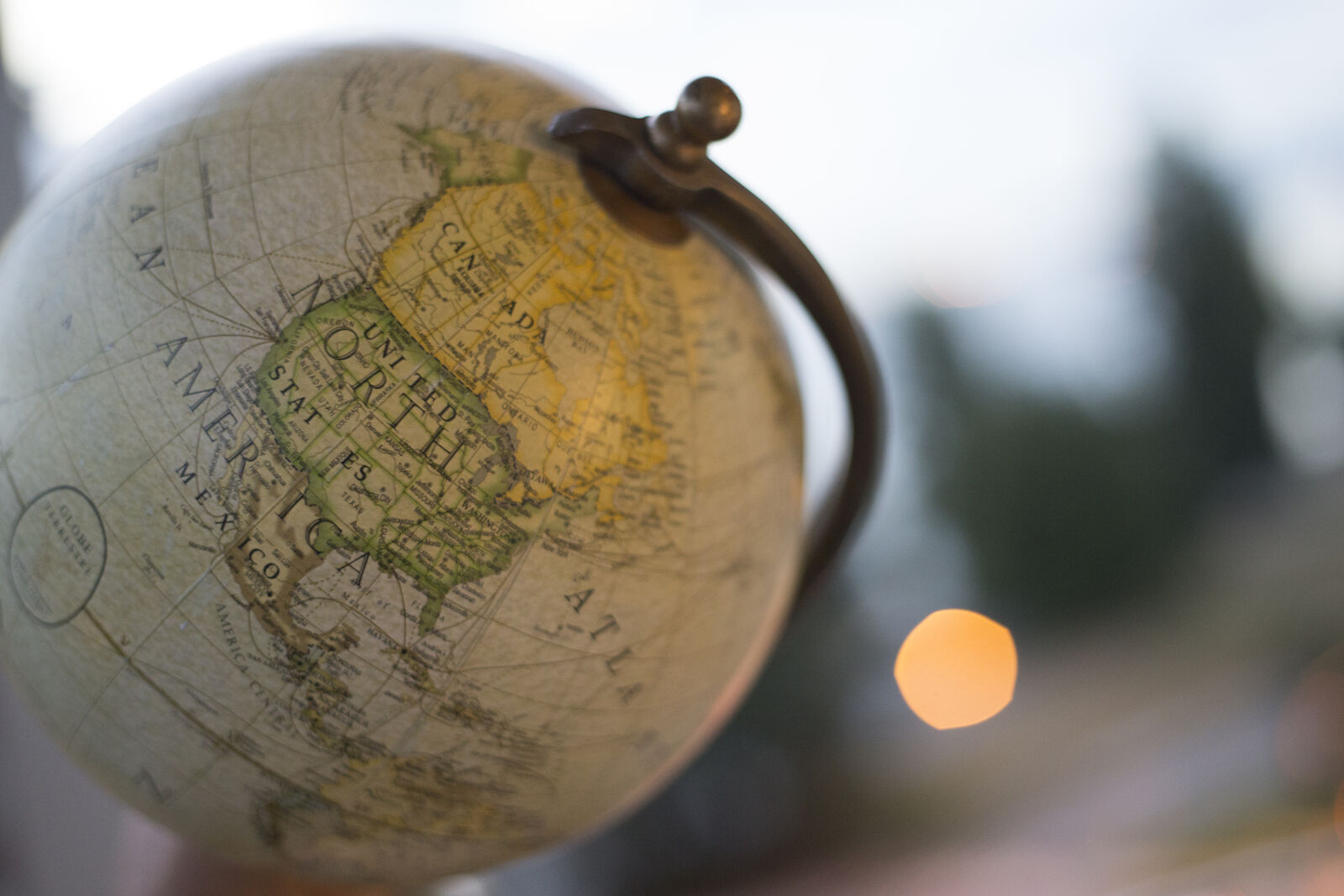 Canon EF 50mm F1.8 II sample photo. America, compass, earth, globe photography