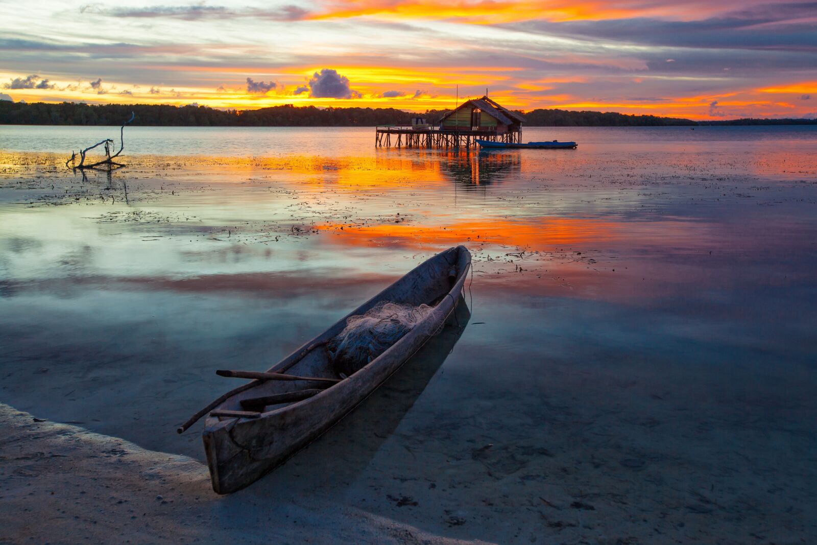 Canon EOS 5D Mark II sample photo. Lagoon, boat, at dusk photography