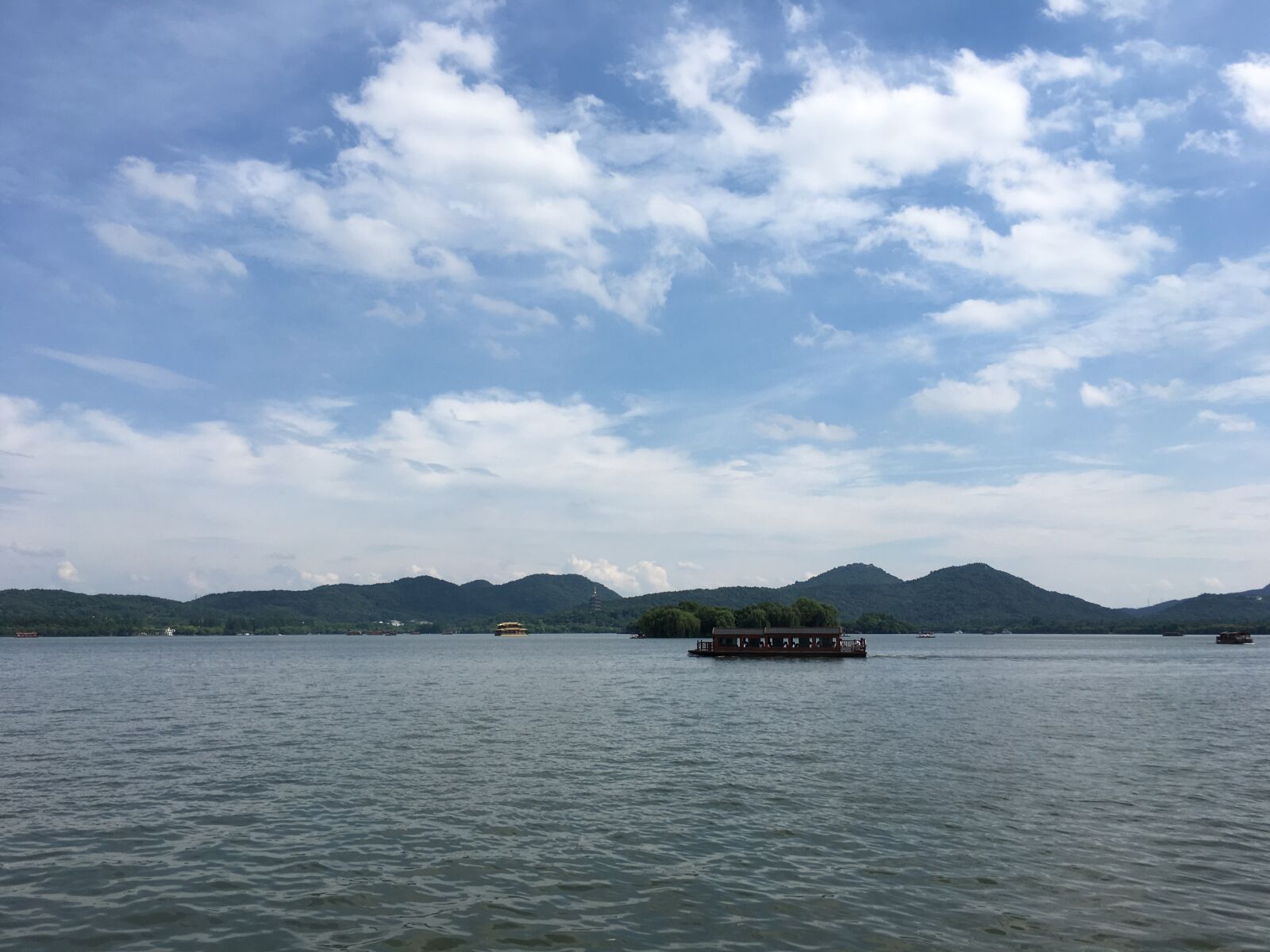 Apple iPhone 6s Plus sample photo. West lake, blue sky photography