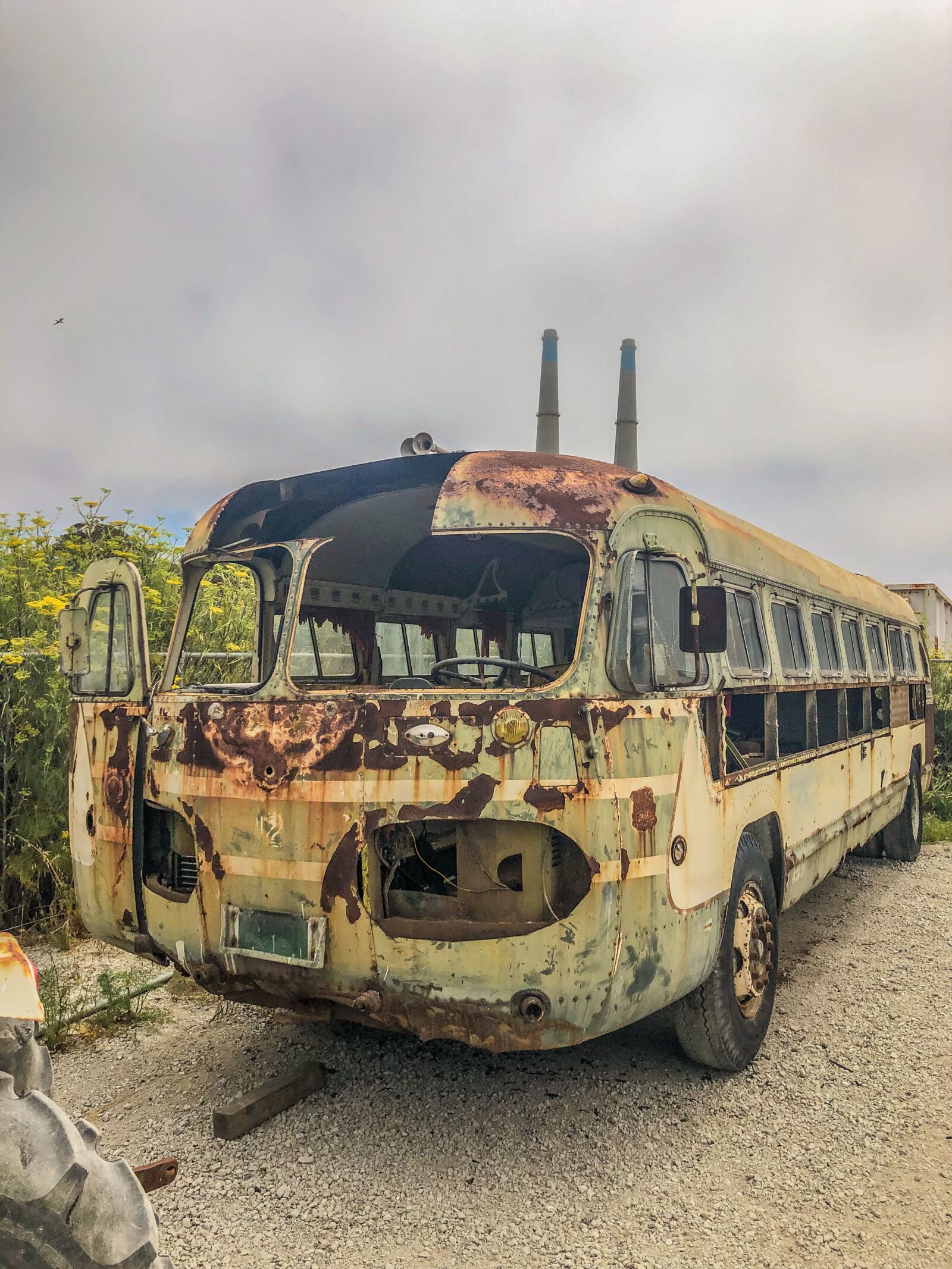 Apple iPhone X sample photo. Moss landing, abandoned bus photography