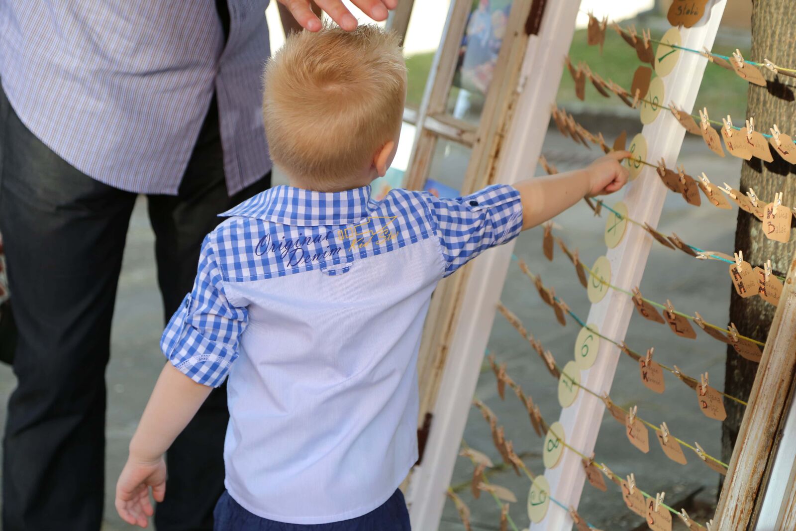 Canon EF 24-105mm F4L IS USM sample photo. Boy, blonde hair, playful photography