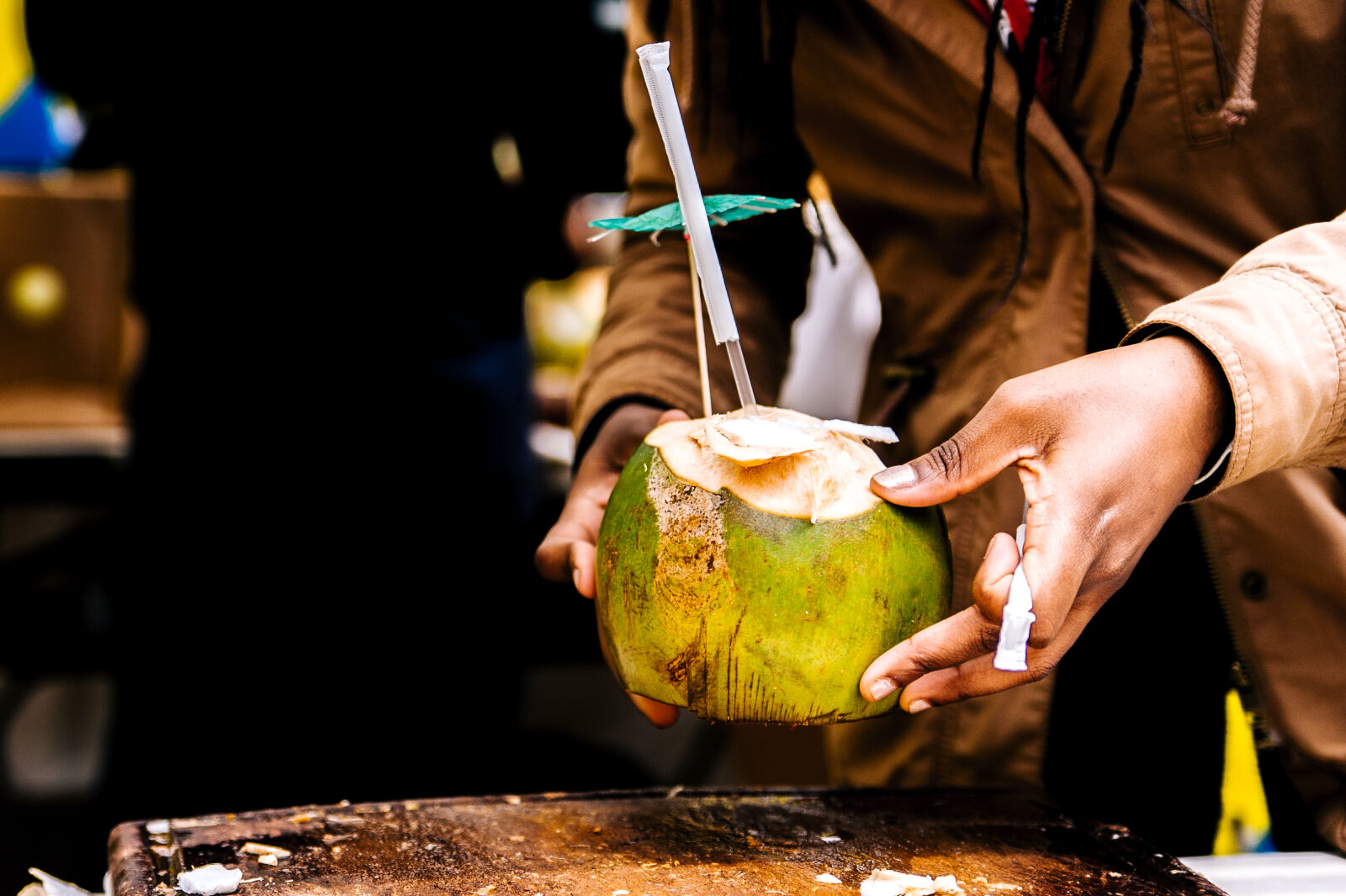 Nikon D700 + Tamron AF 28-75mm F2.8 XR Di LD Aspherical (IF) sample photo. Person, holding, coconut photography