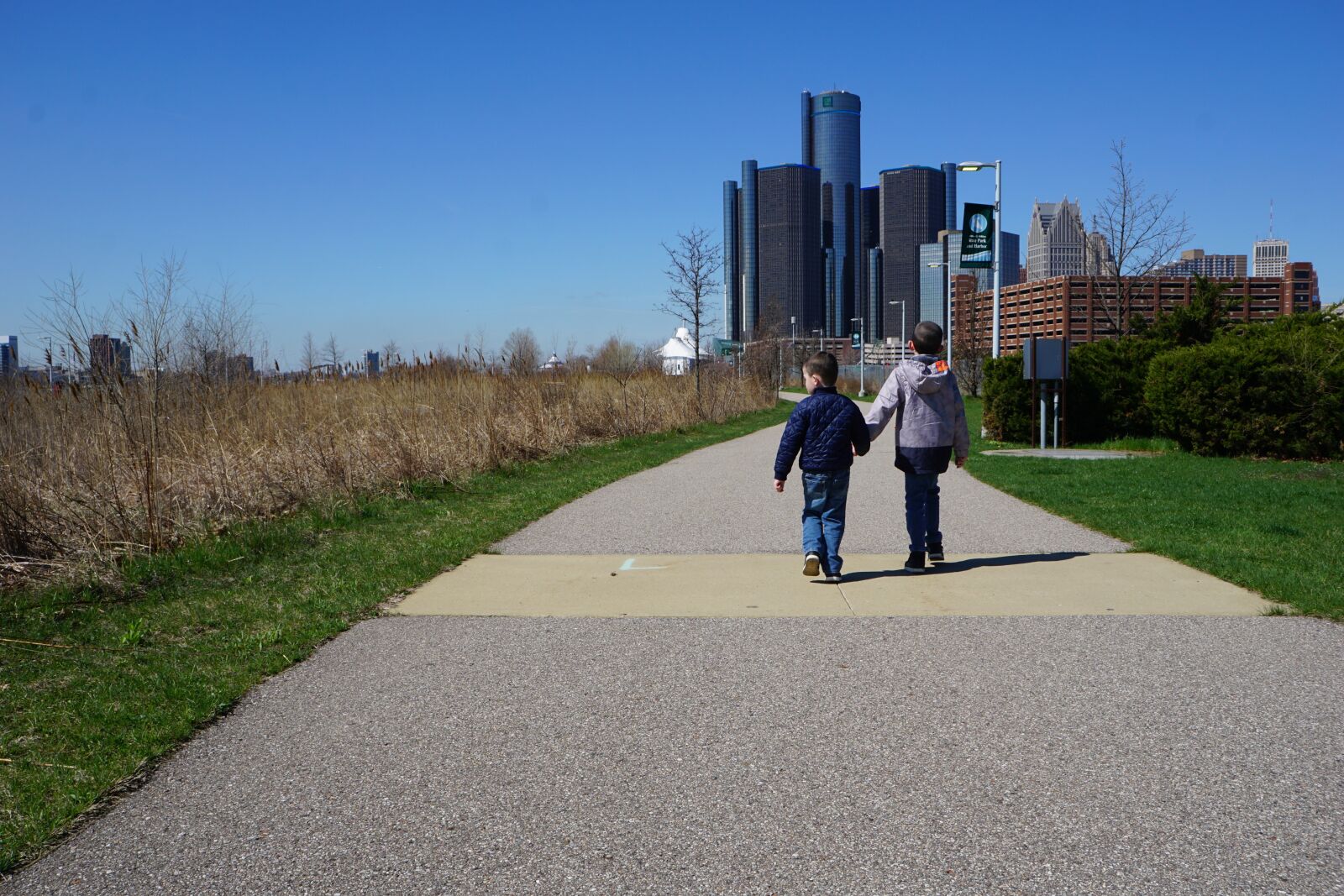 Sony a6000 + Sony E 18-55mm F3.5-5.6 OSS sample photo. Brothers, holding hands, walking photography
