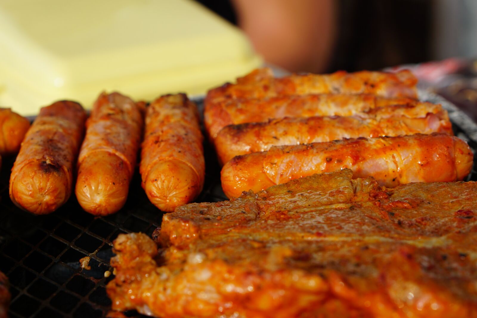 E 50mm F1.8 OSS sample photo. Meat, barbecue, eat photography
