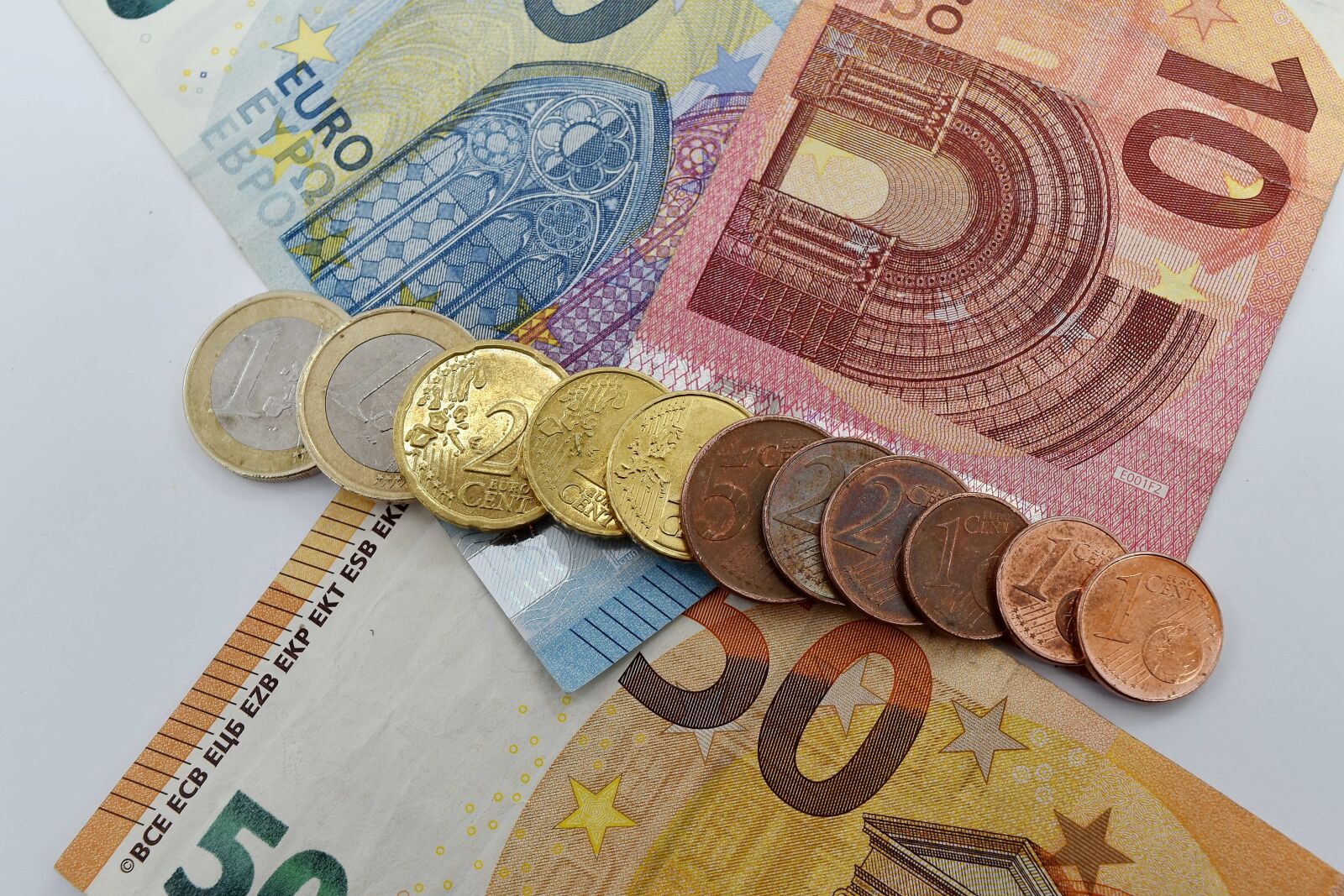 Nikon D5500 sample photo. Cash, coins, finance, income photography