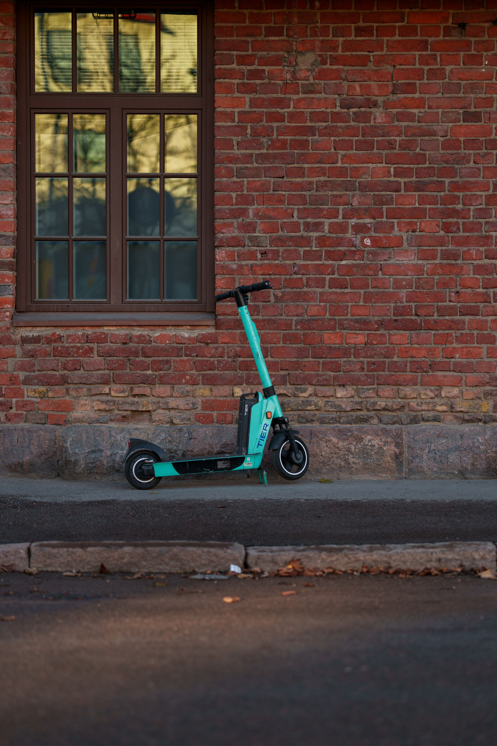 Sony FE 85mm F1.4 GM II sample photo. Scooter parking street photography