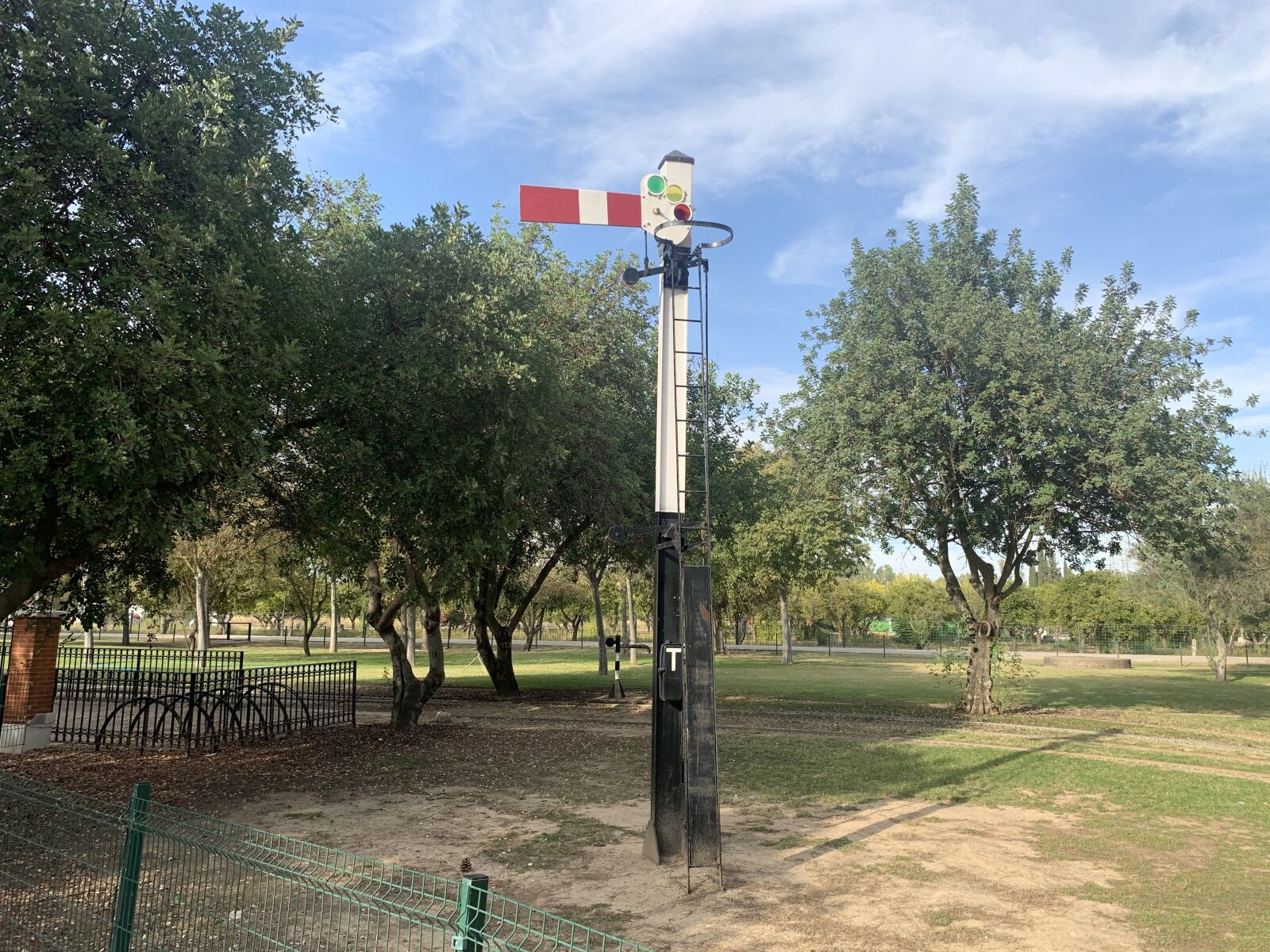 iPhone XS Max back dual camera 4.25mm f/1.8 sample photo. Train, park, blue photography