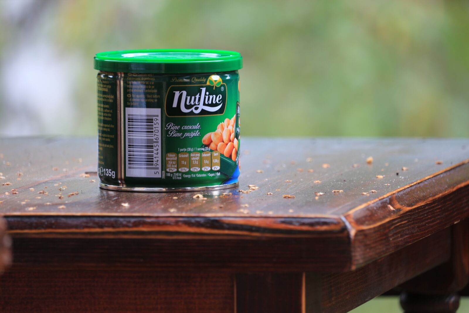 Canon EF-S 55-250mm F4-5.6 IS STM sample photo. Peanut, table, foot photography