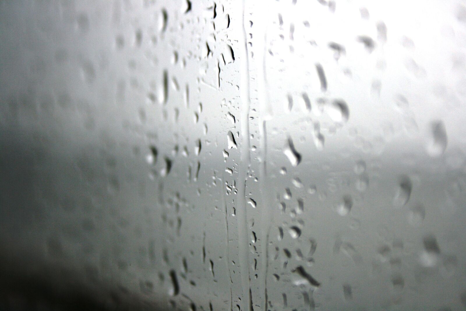 Canon EOS 400D (EOS Digital Rebel XTi / EOS Kiss Digital X) sample photo. Drops, rain, glass photography