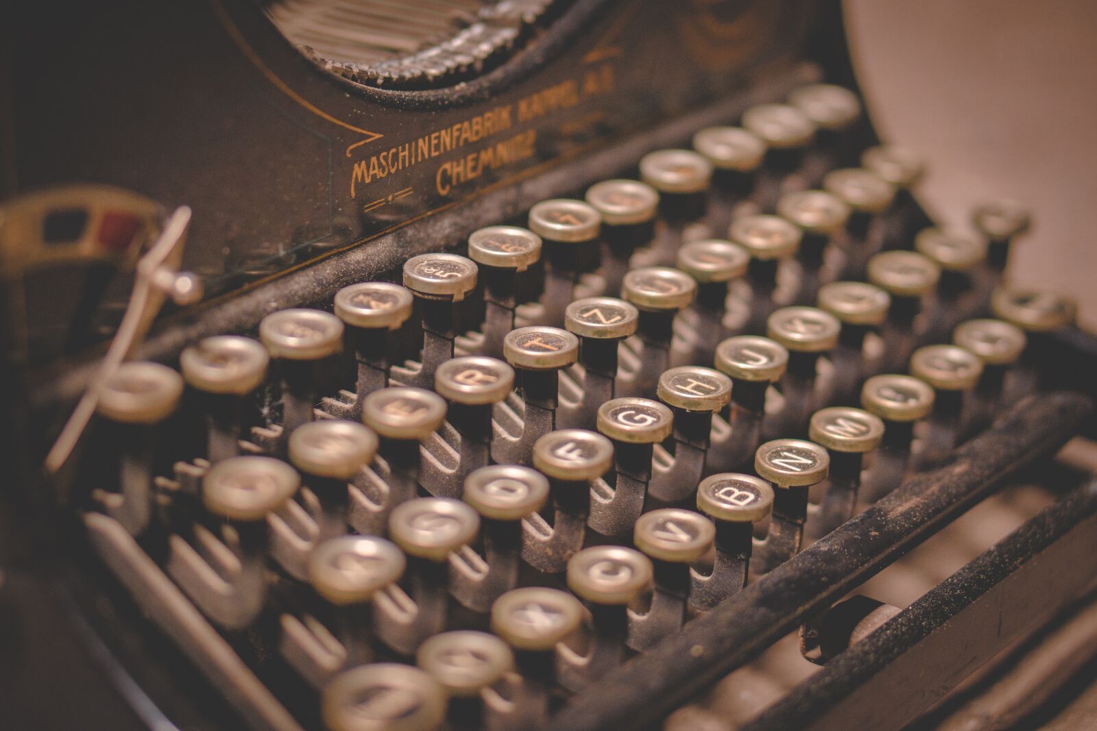 E 50mm F1.8 OSS sample photo. Typewriter, writing, text photography