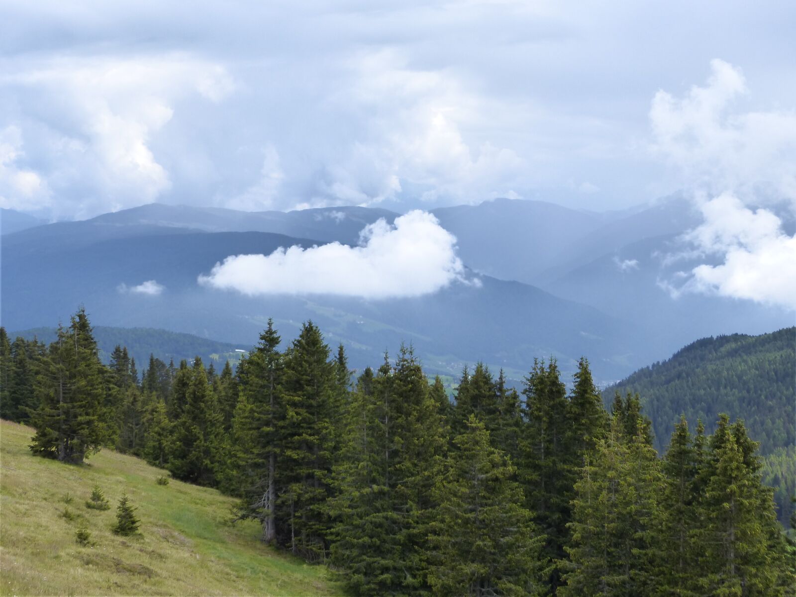 Panasonic Lumix DMC-FZ200 sample photo. Clouds, mountains, forest photography