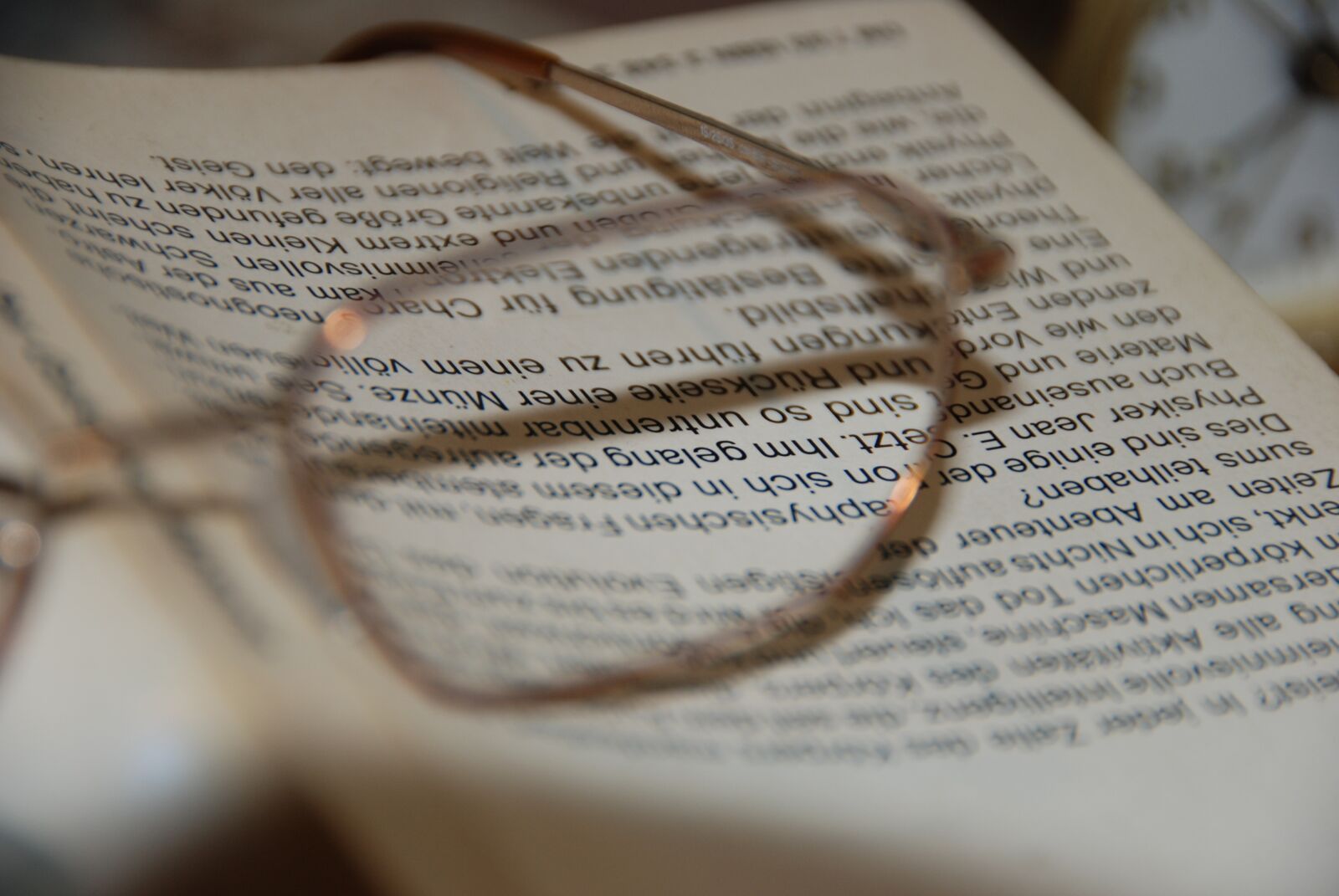 Nikon D80 sample photo. Sharpness, glasses, book photography