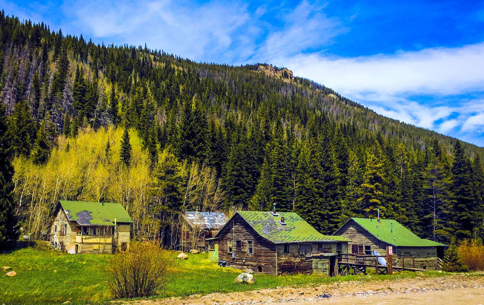 Apple iPhone 6 sample photo. Old houses, forest, cabins photography